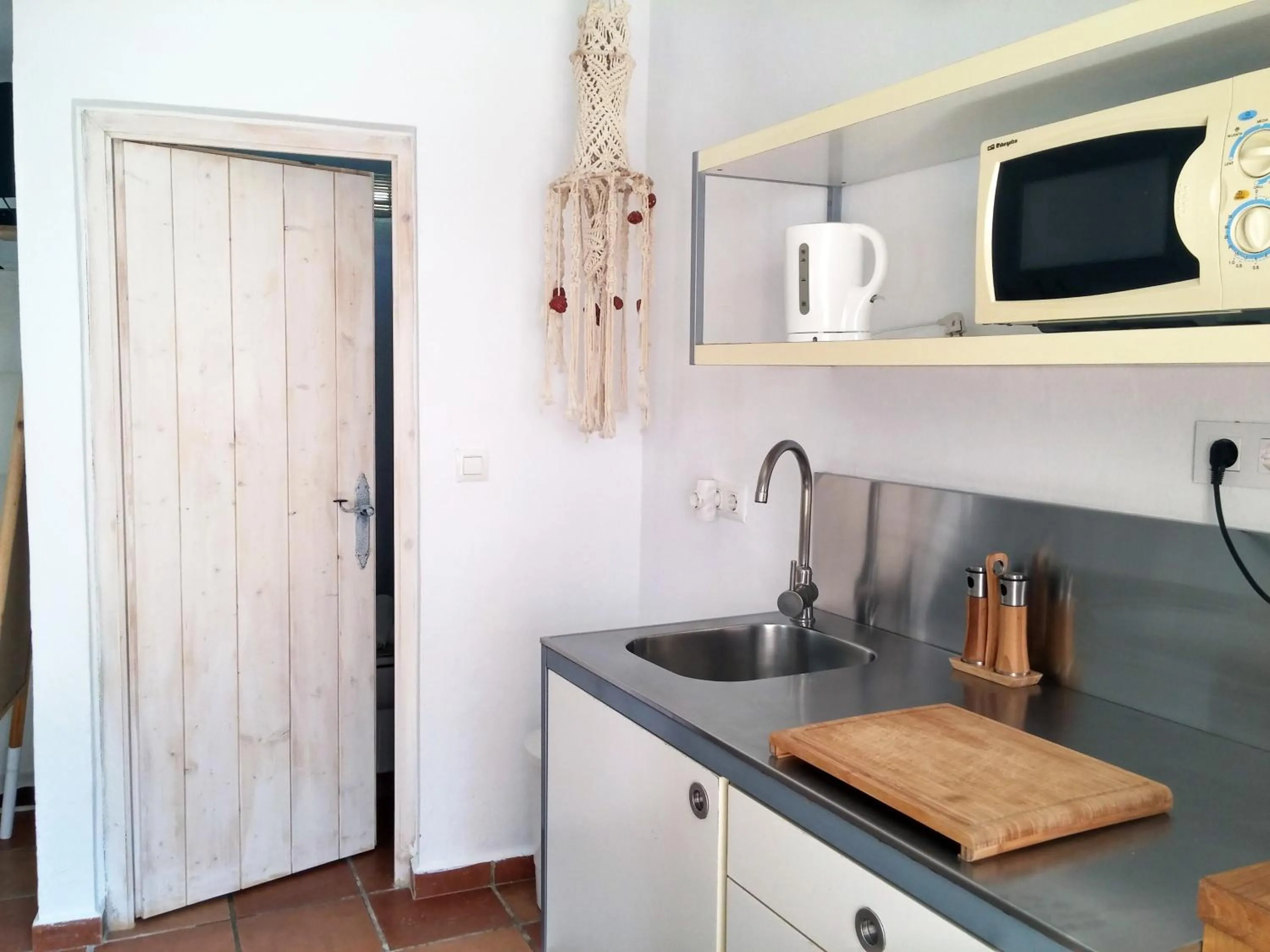 Kitchen or kitchenette in Bungalows Los Castillejos