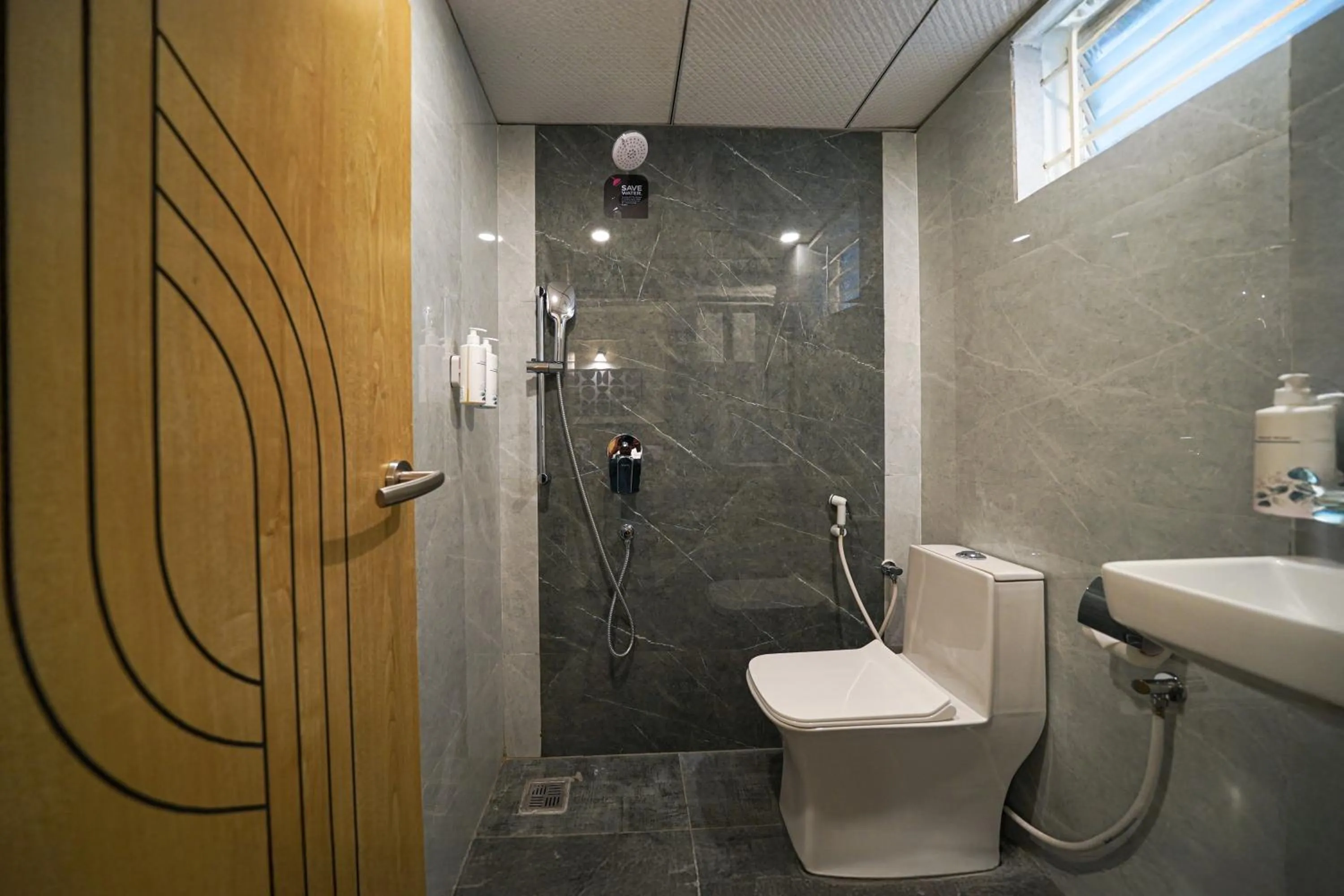 Bathroom in Olive Hotel Kundalahalli by Embassy Group