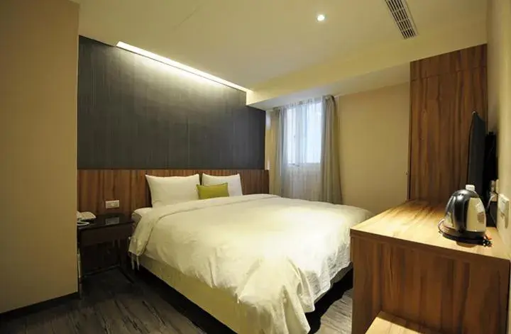 Bed in Shin Shin Hotel - Songshan