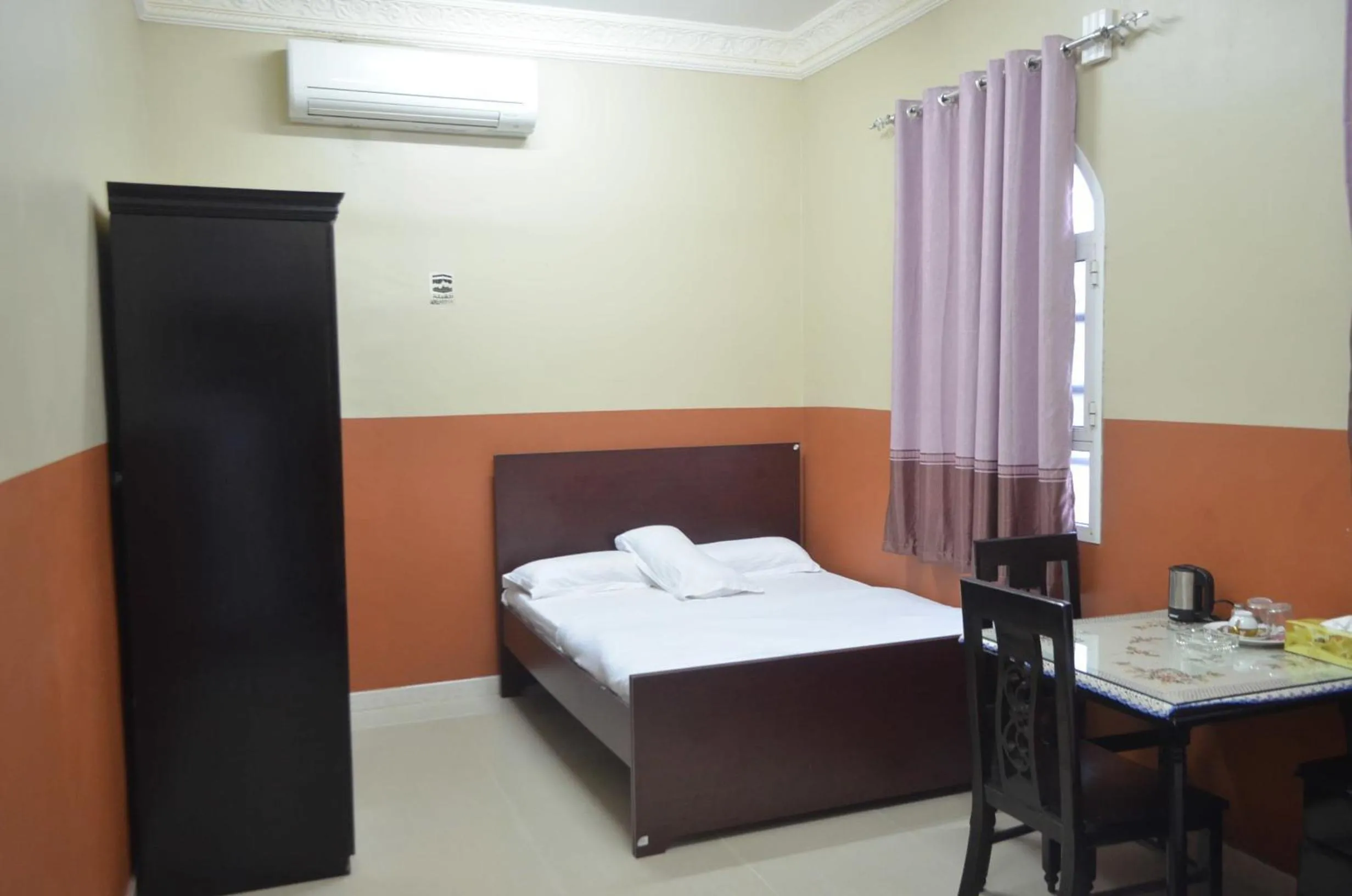 Bed in Five Continents Hotel