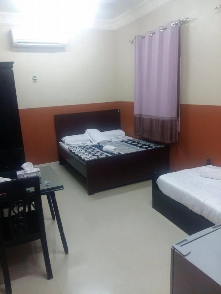 Photo of the whole room, Bed in Five Continents Hotel