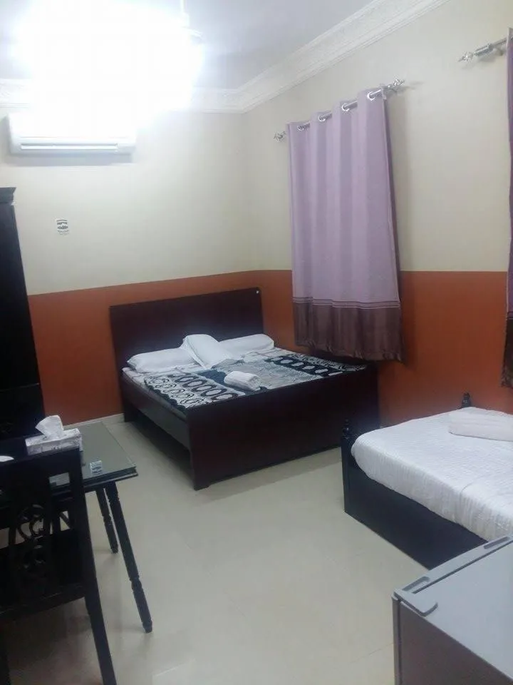 Photo of the whole room, Bed in Five Continents Hotel