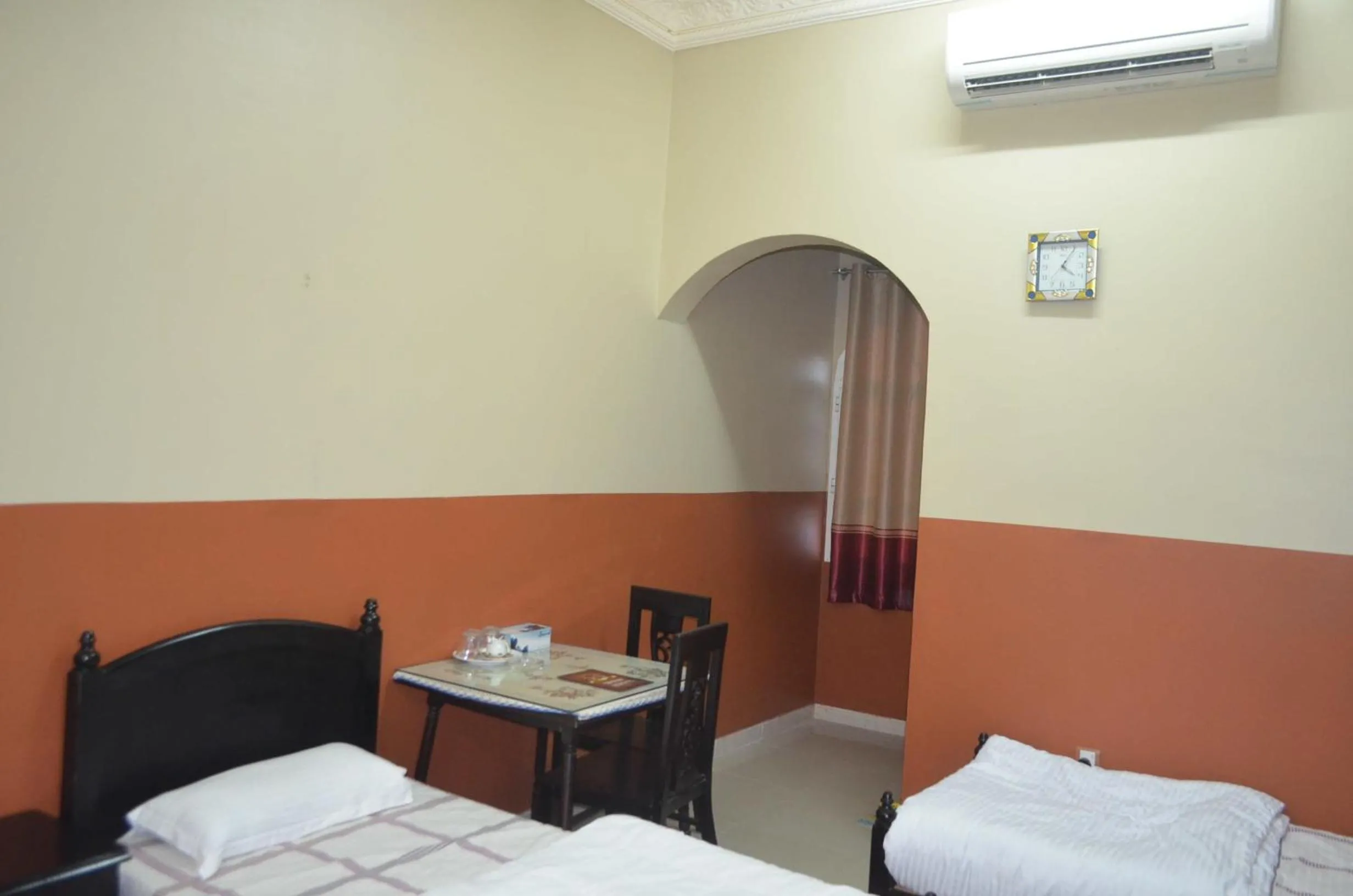 Bed in Five Continents Hotel