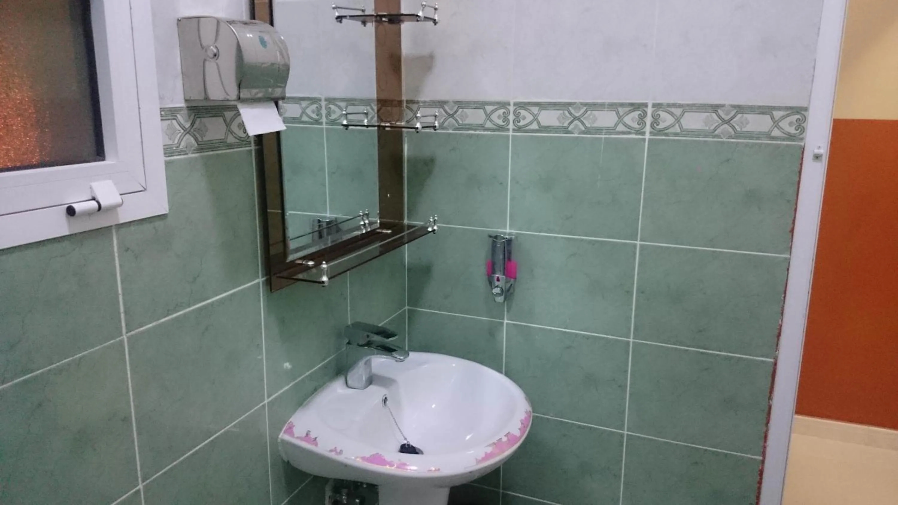 Property building in Five Continents Hotel