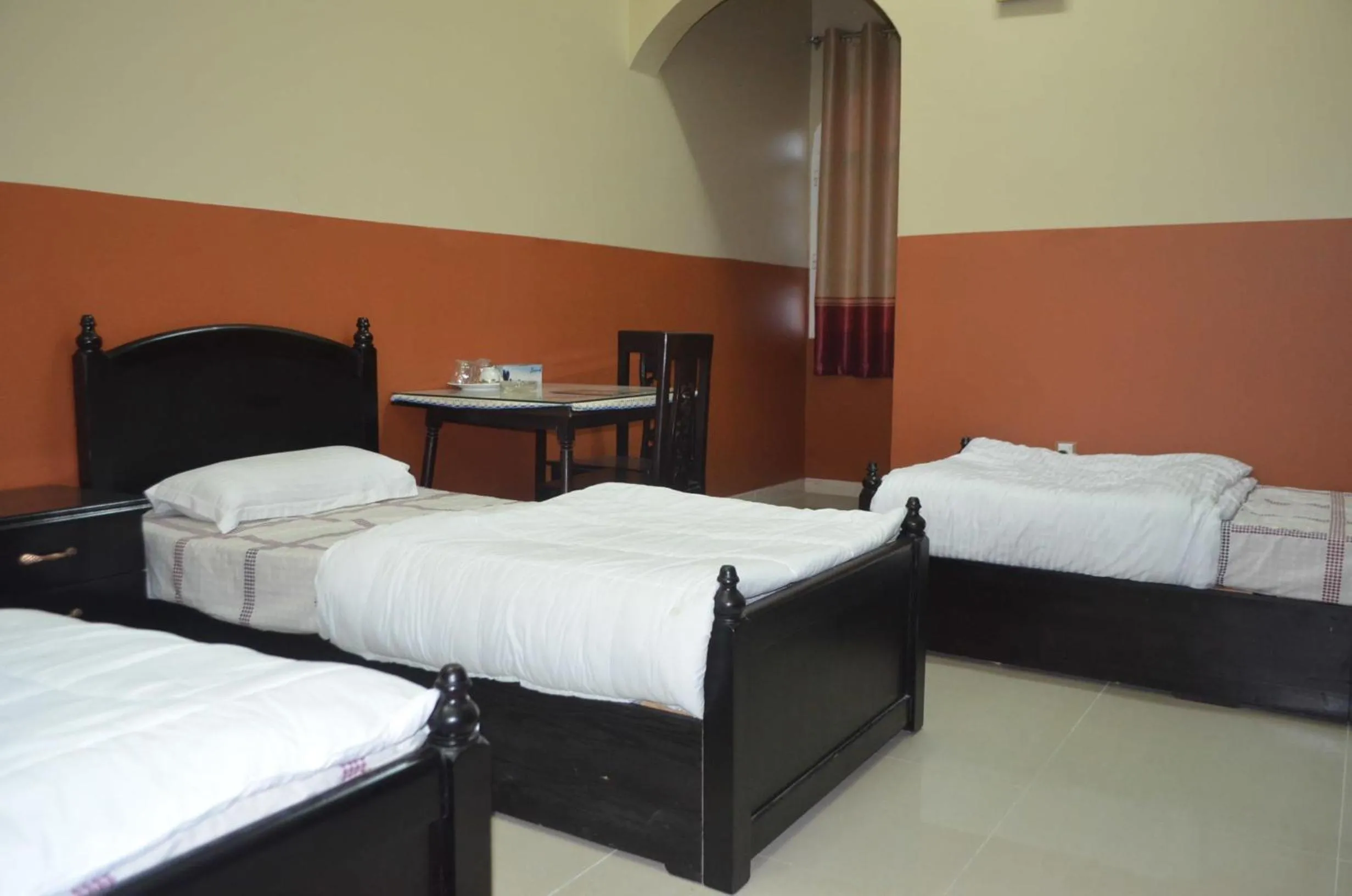 Bed in Five Continents Hotel