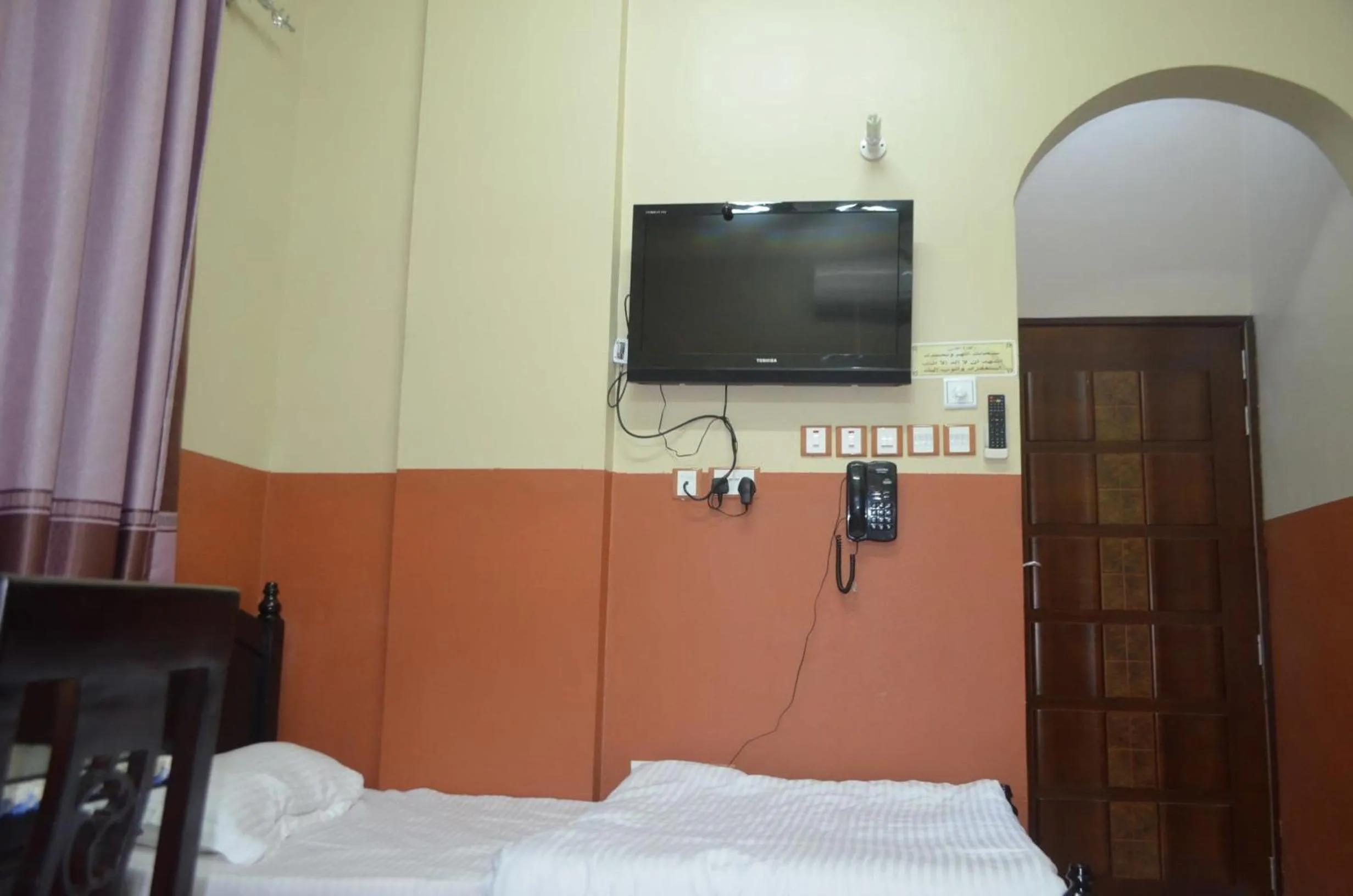 Bed in Five Continents Hotel