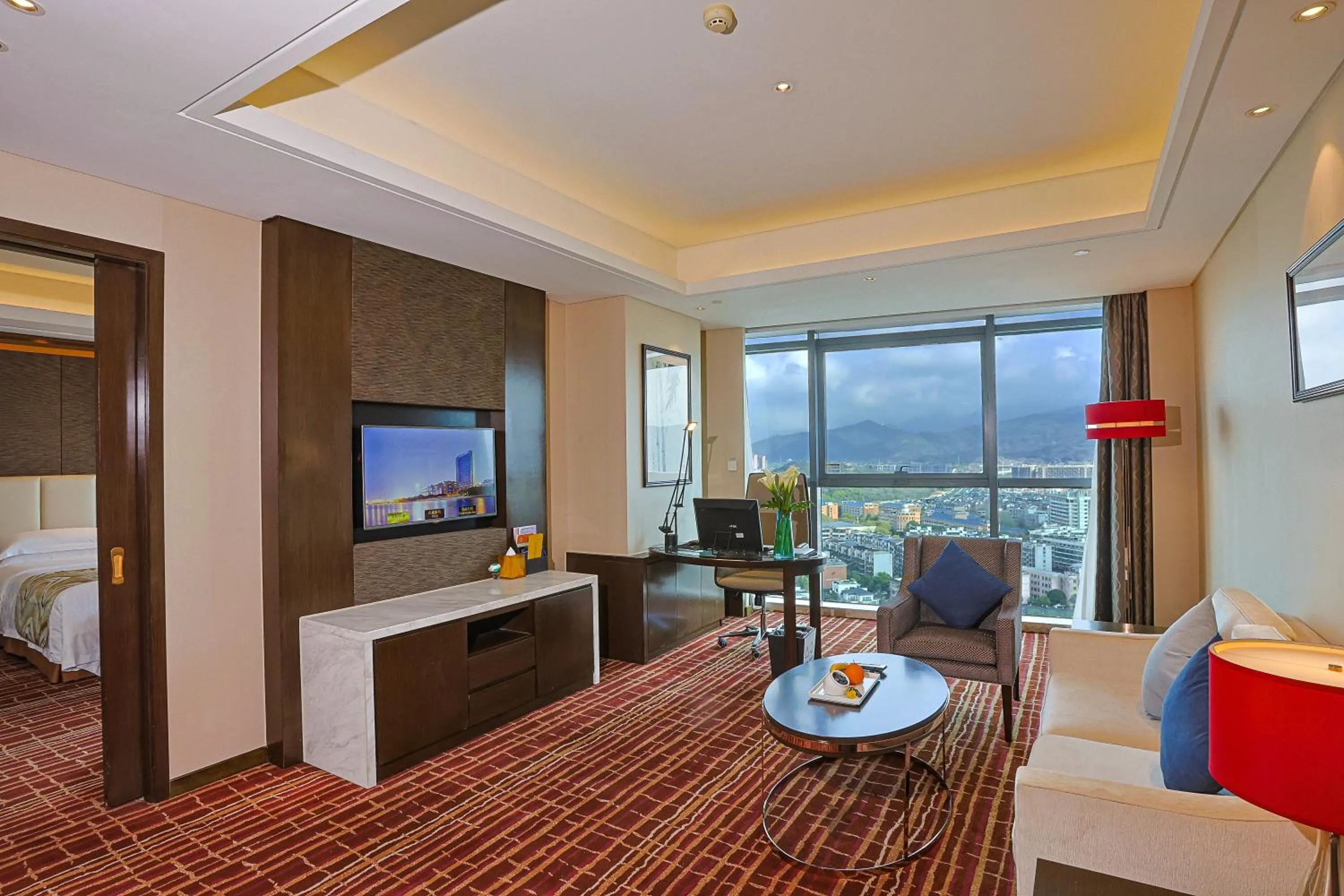 Living room, Bed in Yiwu Shangcheng Hotel