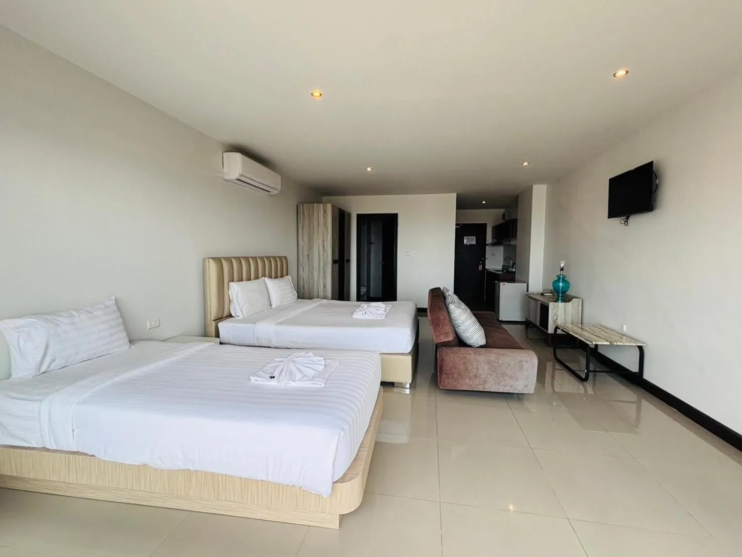 Bed in Ocean View Treasure Residence