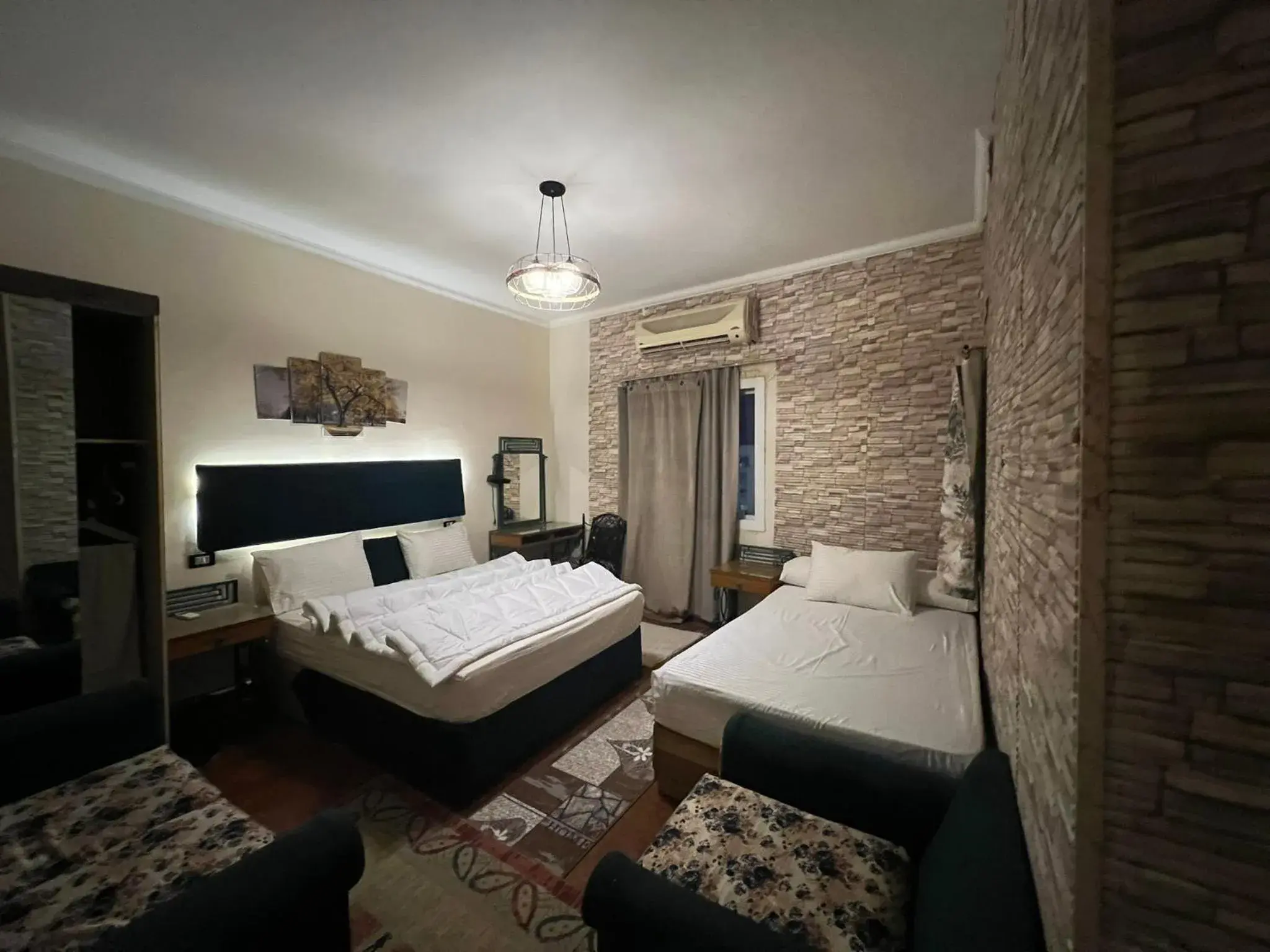 Deluxe Double or Twin Room with Mountain View in A pyramids view Deluxe Double or Twin Room with Mountain View in A pyramids view