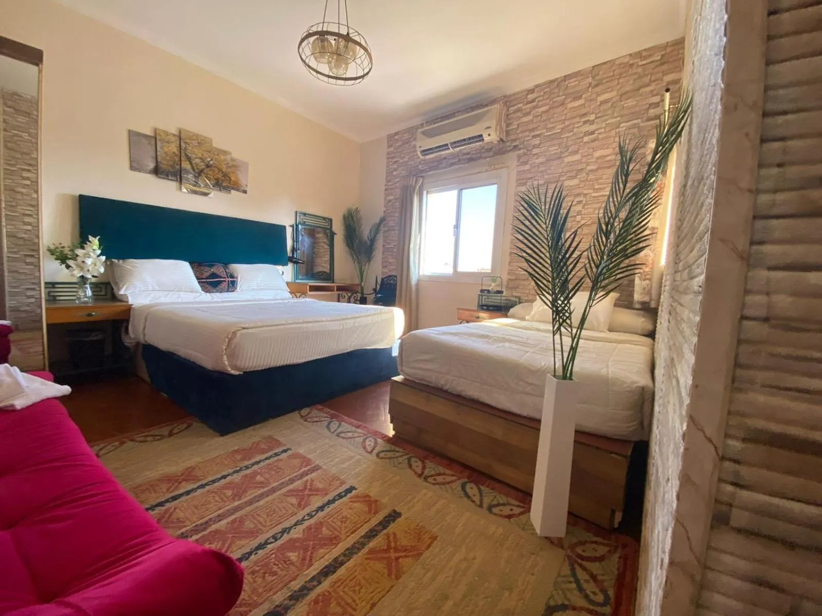 Photo of the whole room, Bed in A pyramids view