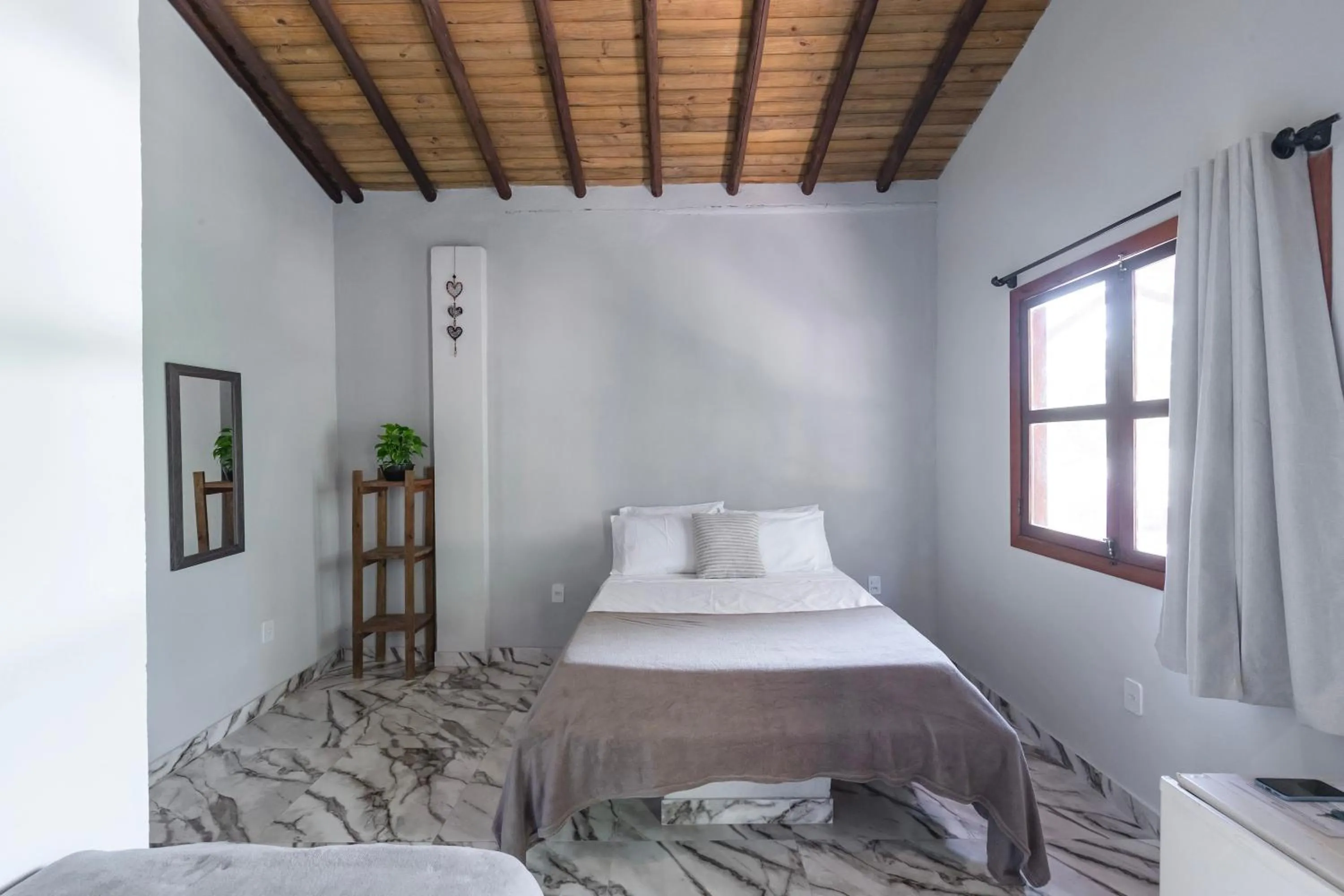 Bed in Pousada Arraial dos Sonhos