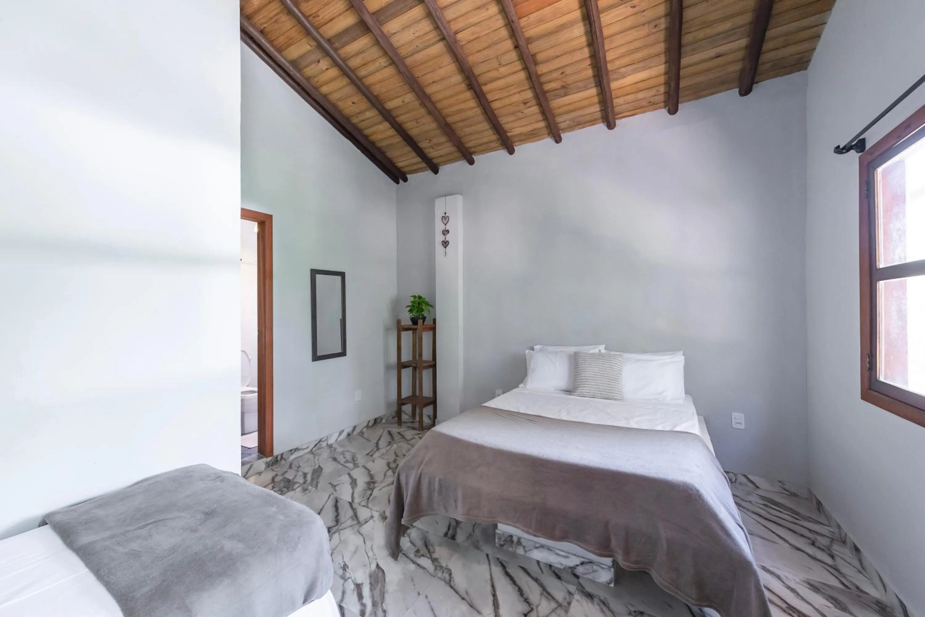 Bed in Pousada Arraial dos Sonhos