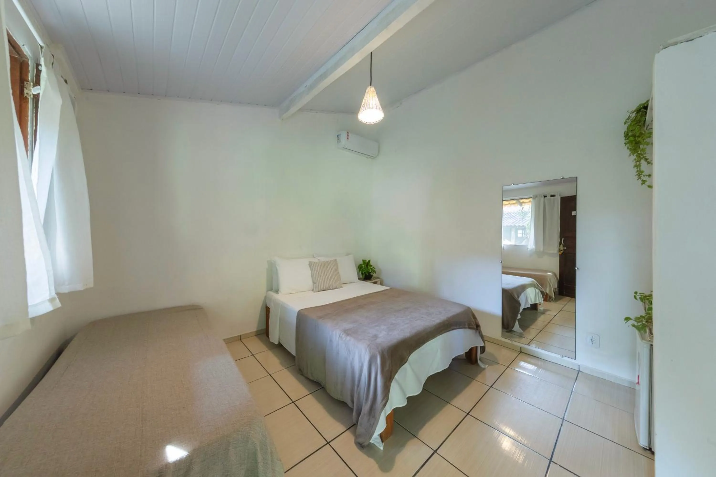 Bed in Pousada Arraial dos Sonhos