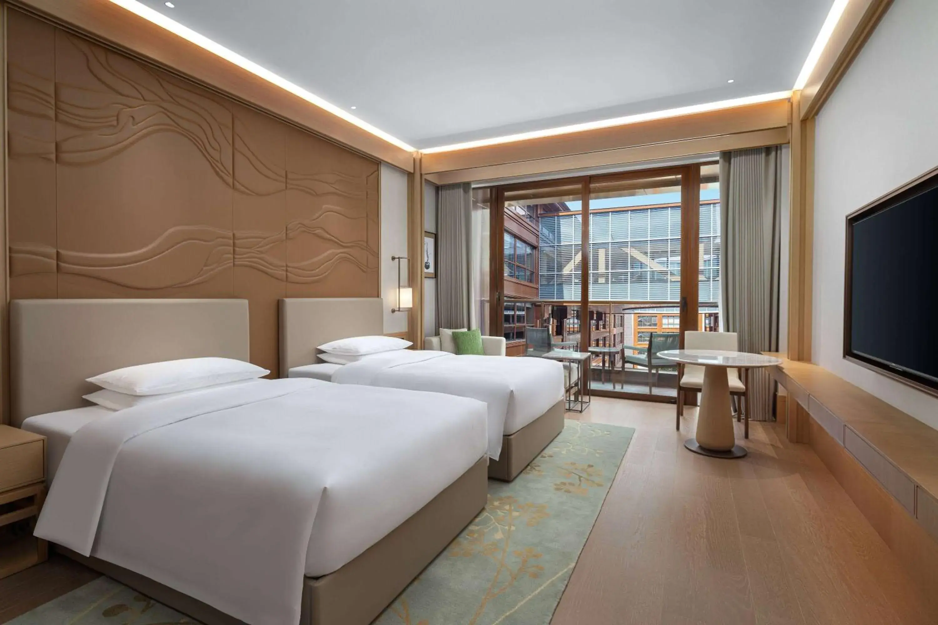 Photo of the whole room, Bed in Wyndham Grand Xinchang Downtown Photo of the whole room, Bed in Wyndham Grand Xinchang Downtown