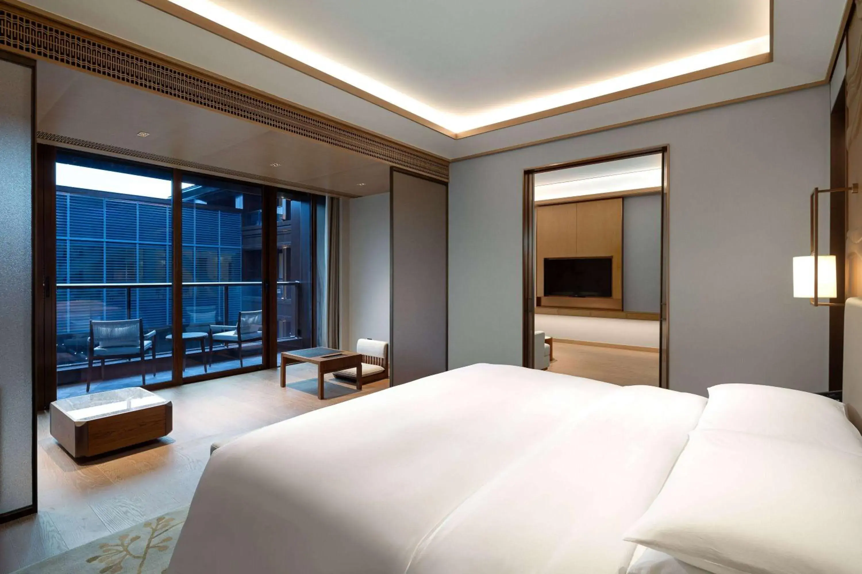 Photo of the whole room, Bed in Wyndham Grand Xinchang Downtown Photo of the whole room, Bed in Wyndham Grand Xinchang Downtown