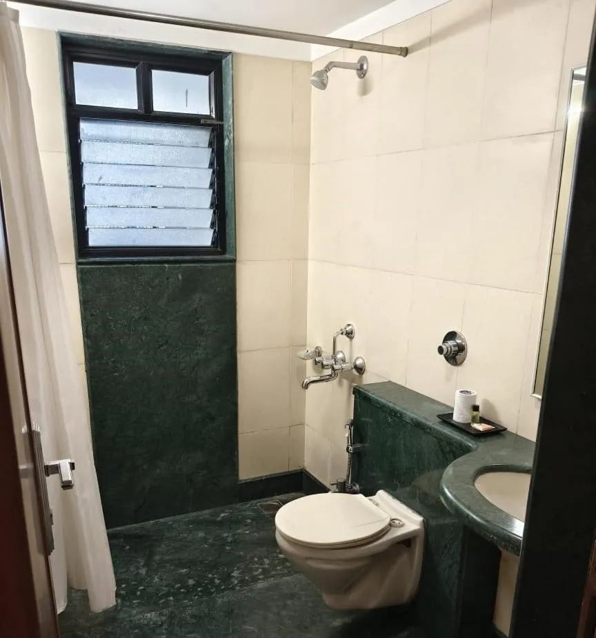 Toilet in Magnus Fortune House Business Hotel , Magarpatta