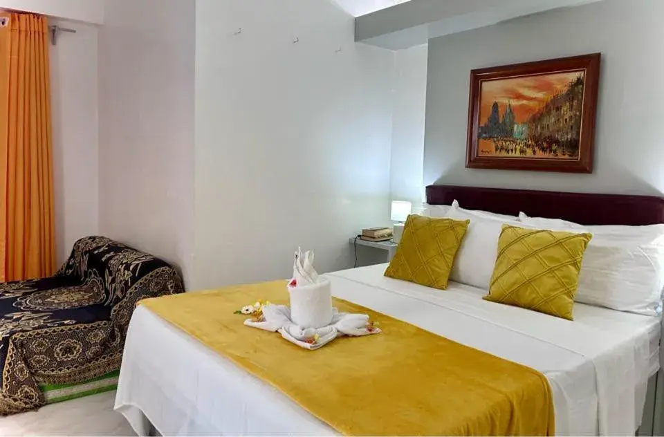 Bed in Moonlight Breeze Inn Boracay Bed in Moonlight Breeze Inn Boracay