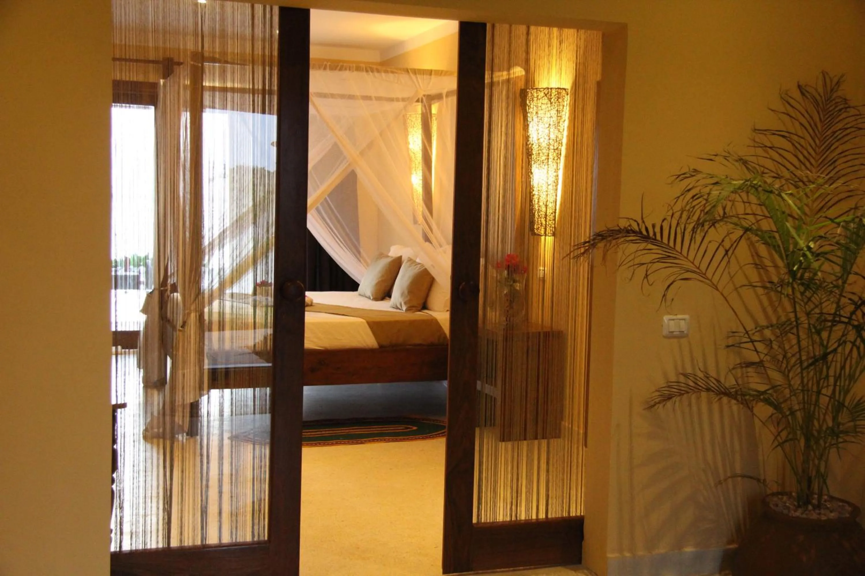 Toilet, Bed in Fruit & Spice Wellness Resort Zanzibar