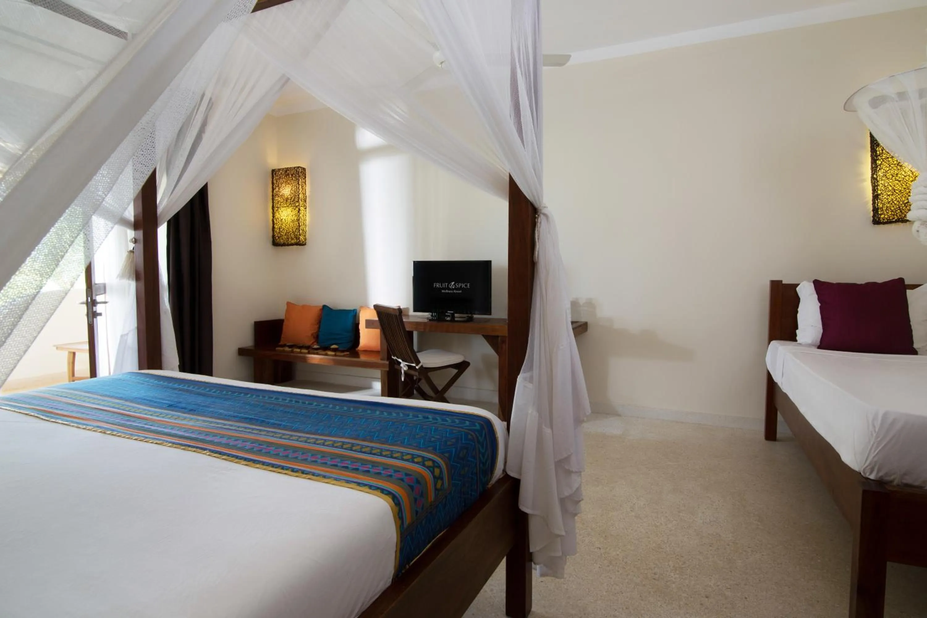 TV and multimedia, Bed in Fruit & Spice Wellness Resort Zanzibar