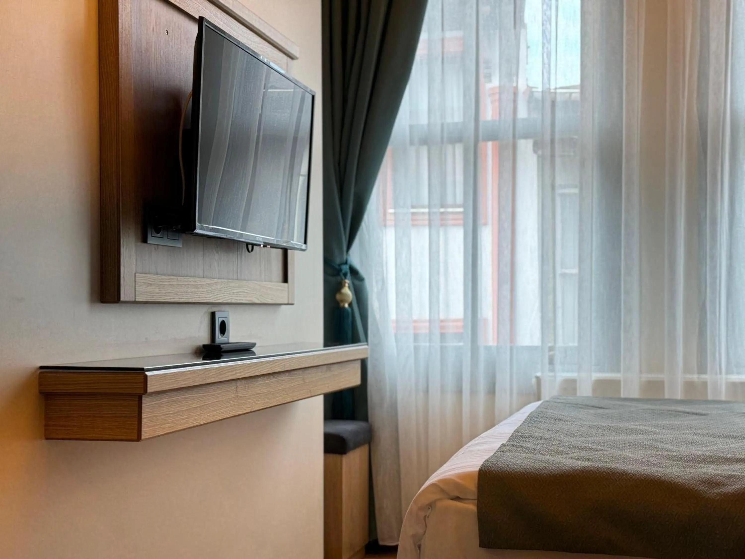 Bed in Abelia Mansion Hotel