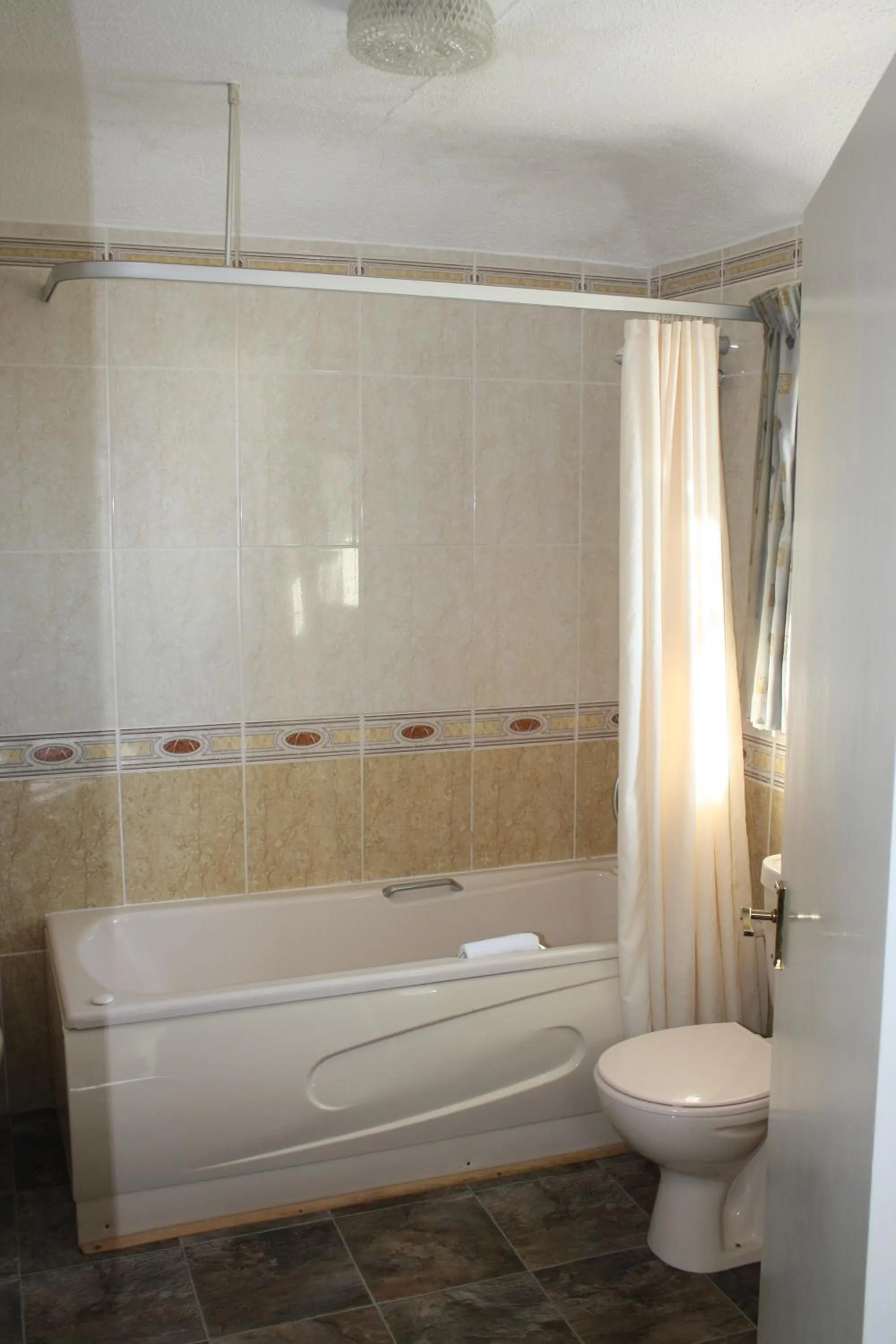 Toilet in The Devoncourt Resort