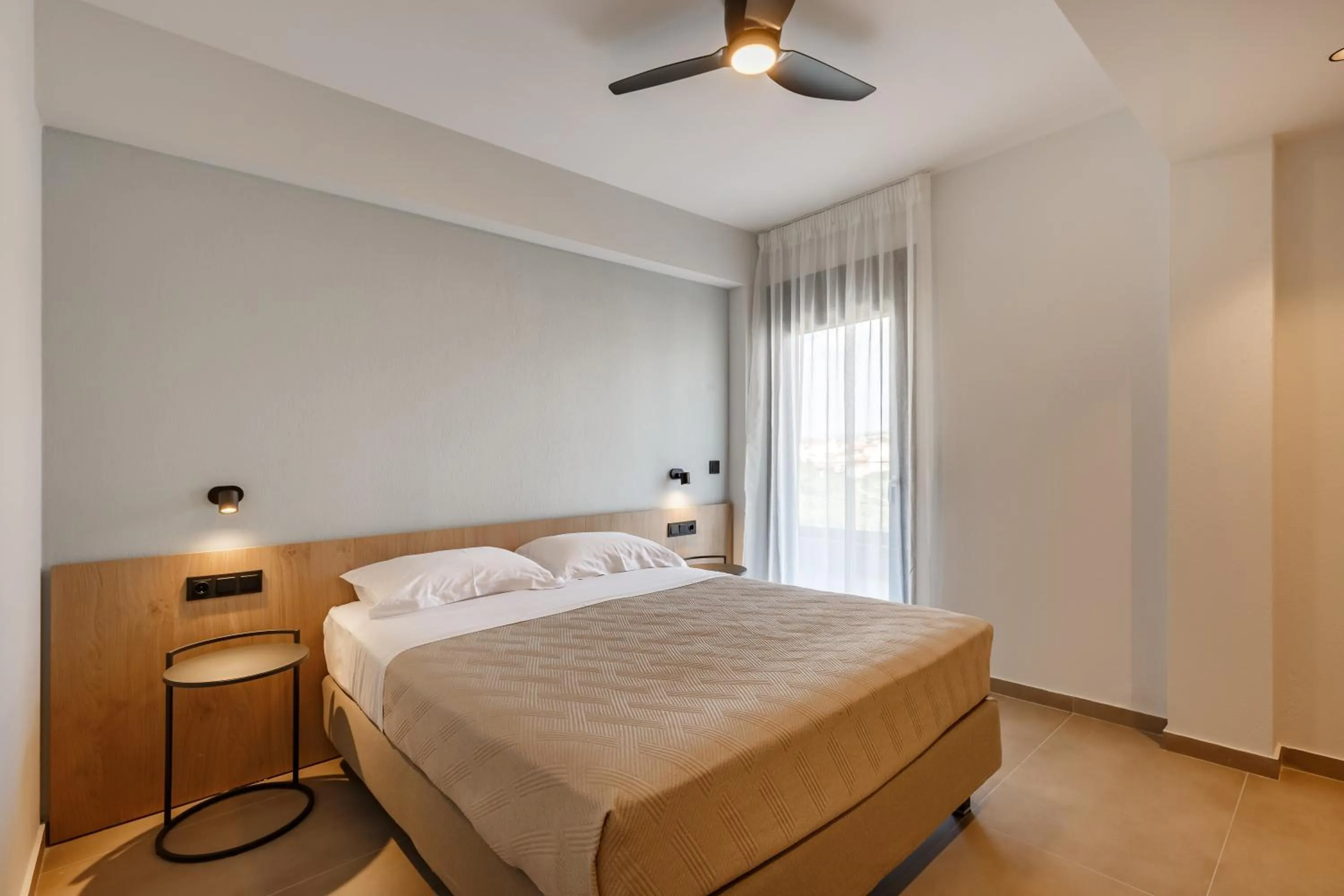 Bed in Dimi Residence