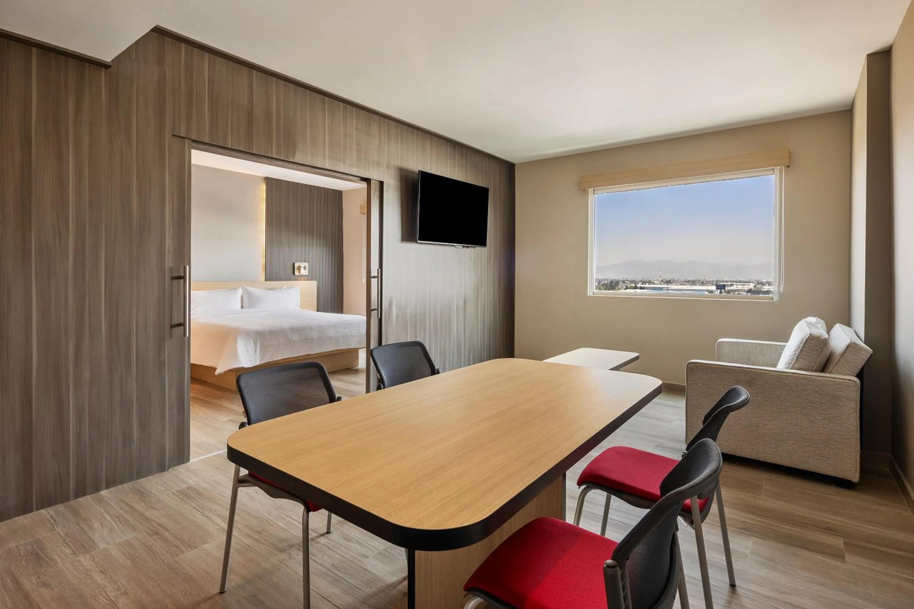 Communal lounge/ TV room, Bed in Gamma Toluca