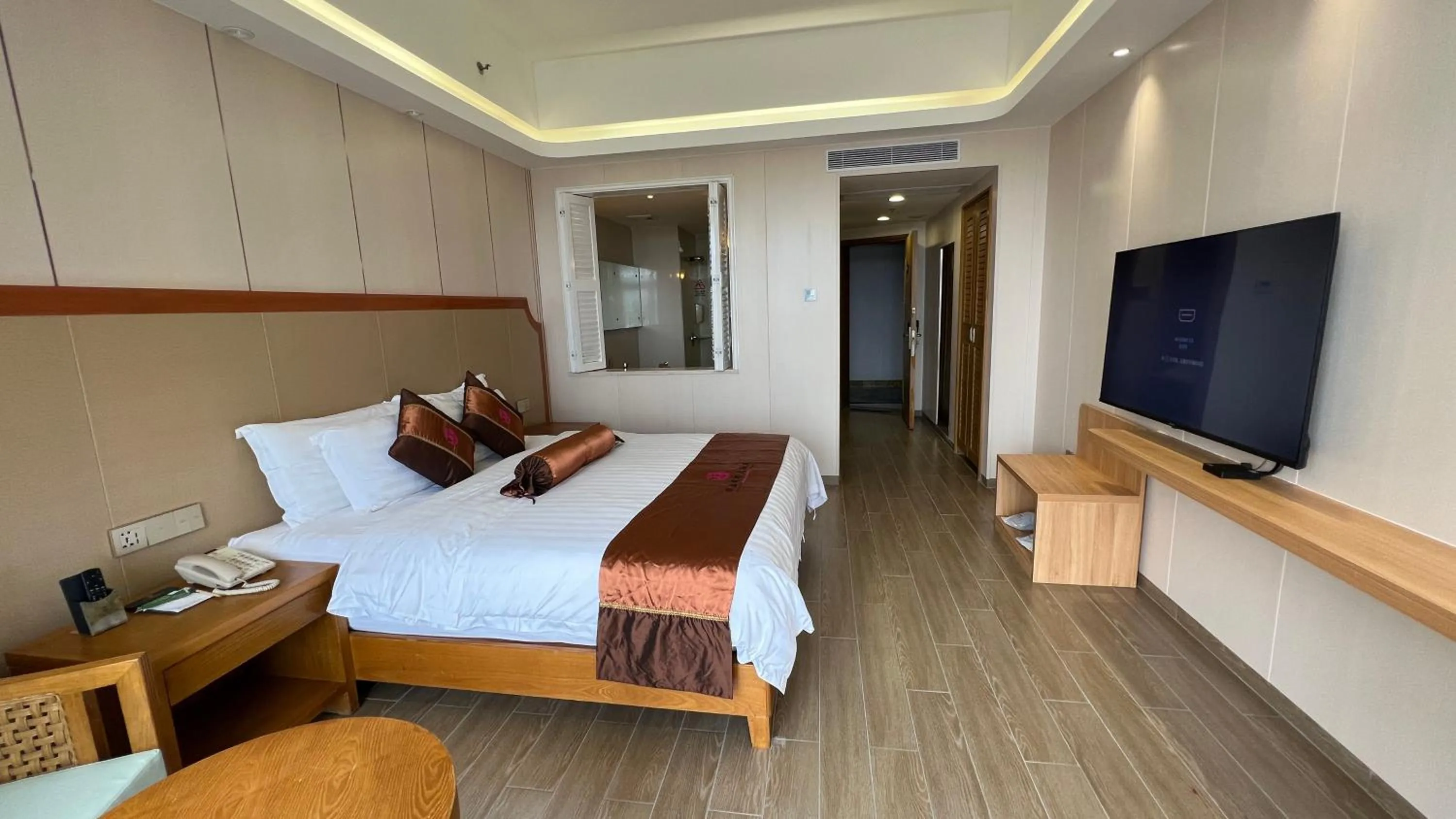 Photo of the whole room, Bed in Wenchang Waika Hotel