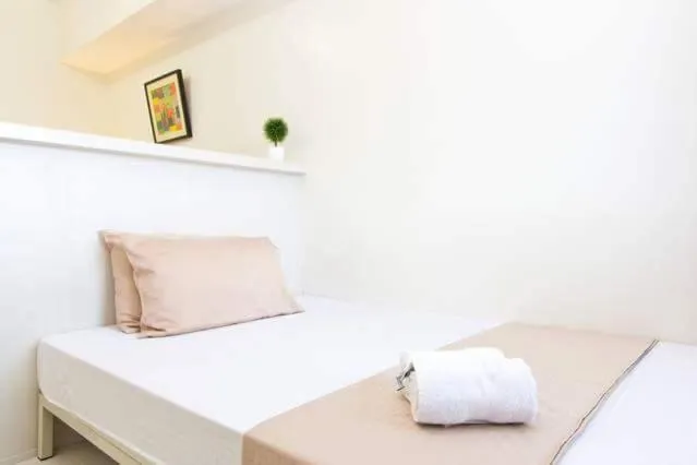 Bedroom, Bed in Condo Studio Luxe in Princeton Residences