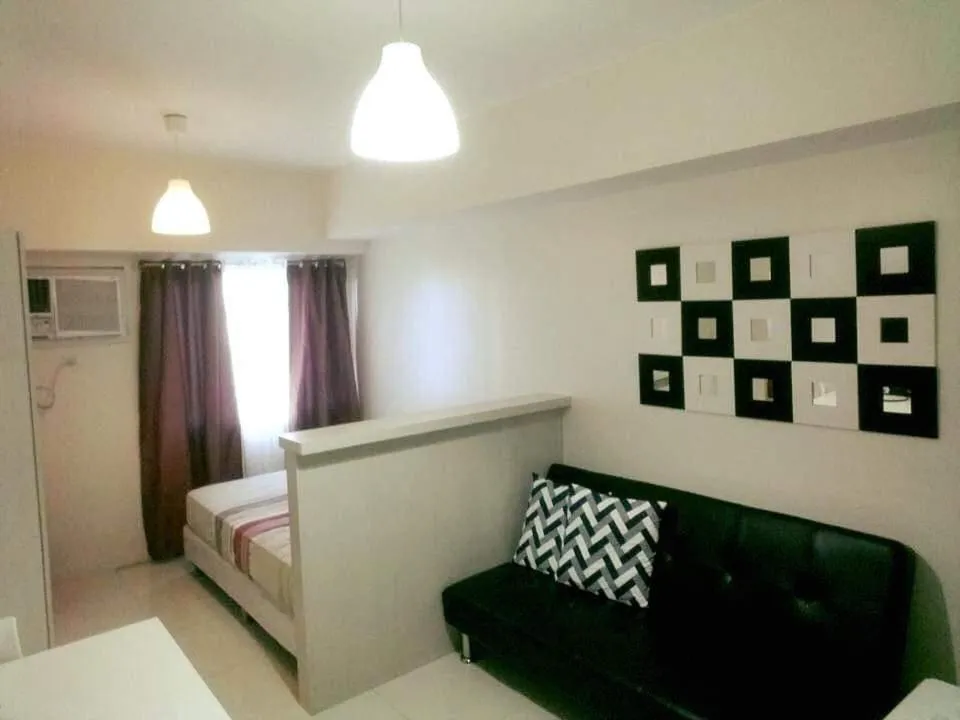 Bed in Condo Studio Luxe in Princeton Residences