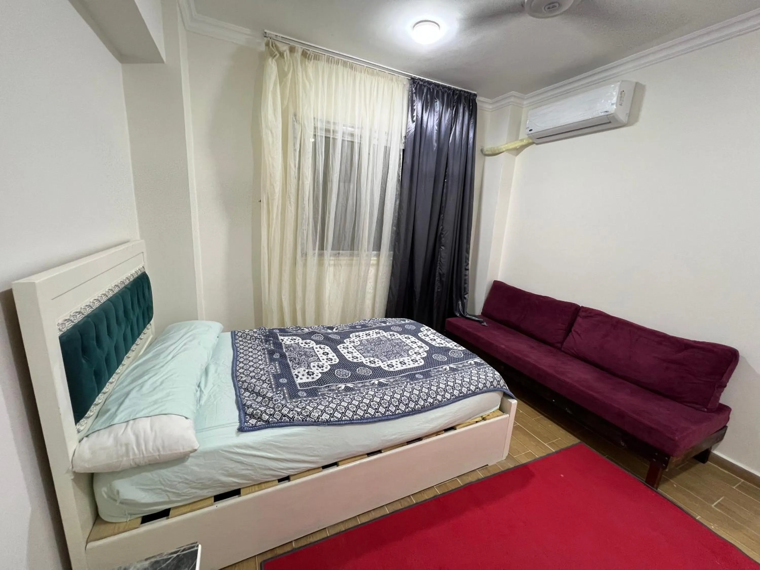 Bed in Garden view 3 BR 2 balconies in compound