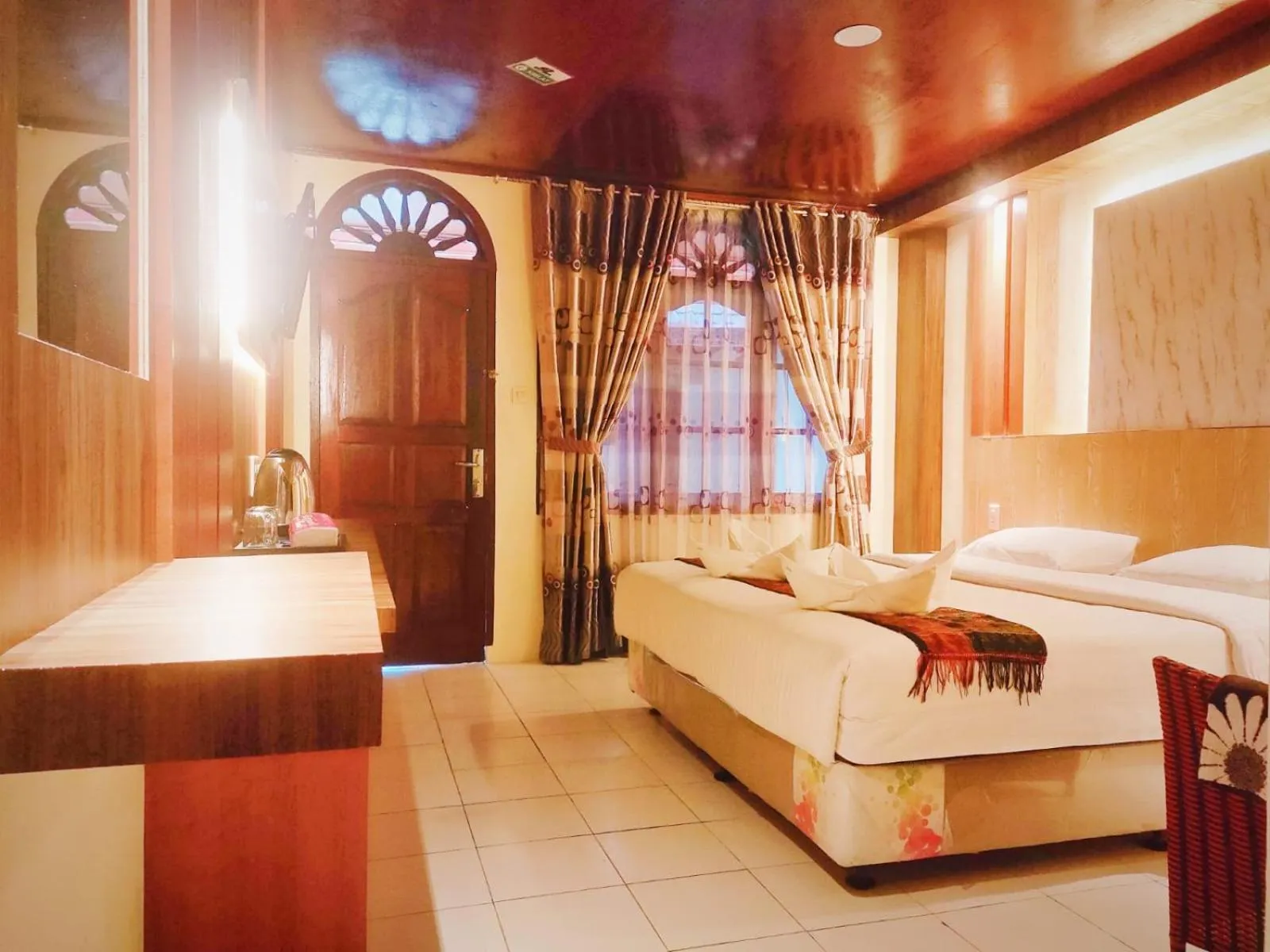 Bed in Judita Cottages