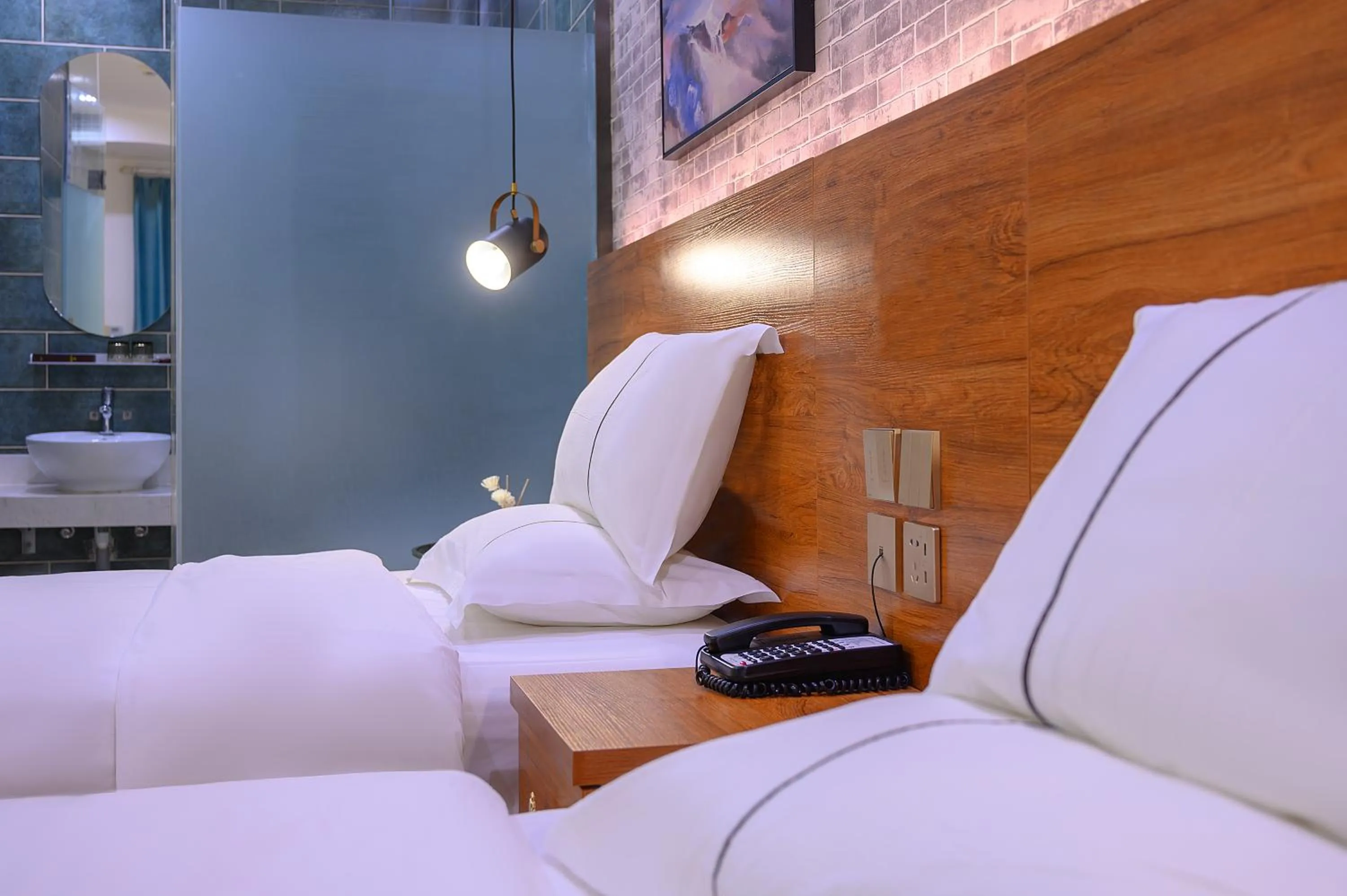 Bed in QiQiaoWu Fashion Hotel - Beijing Songjiazhuang Subway Station