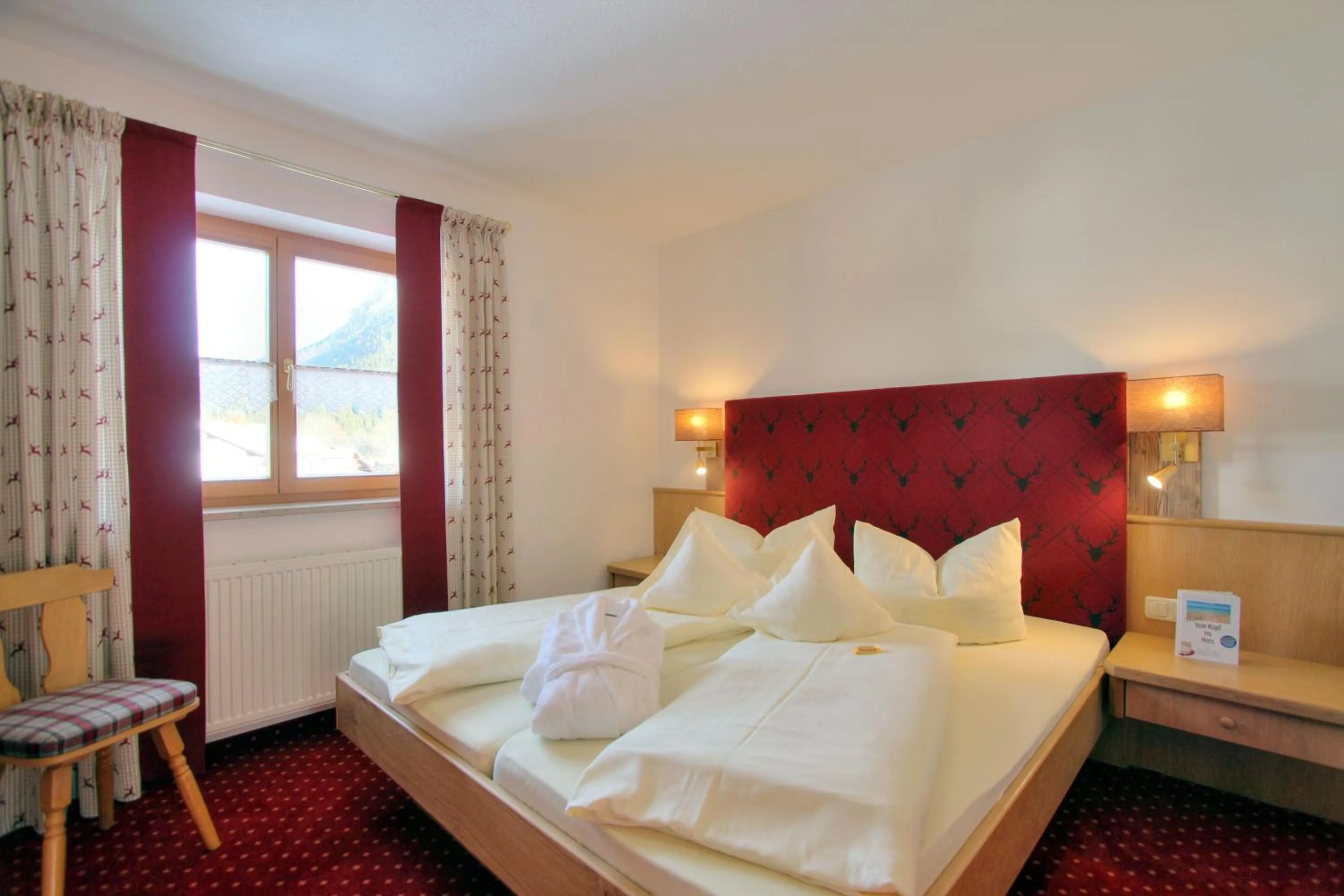 Photo of the whole room, Bed in Landhotel Berghof