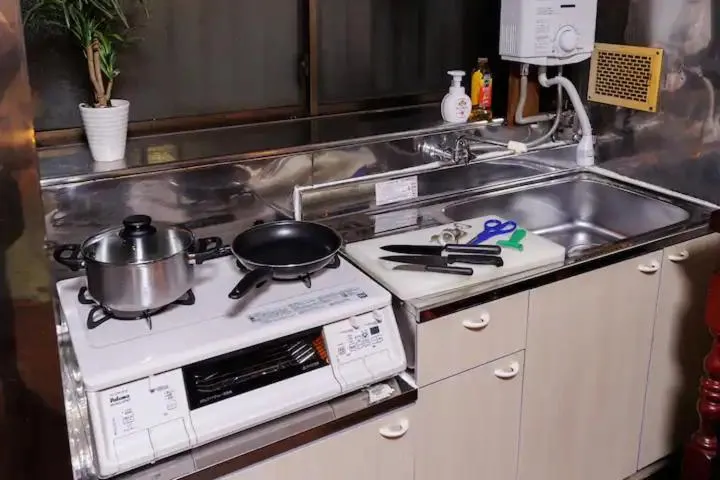 Kitchen or kitchenette in SK House