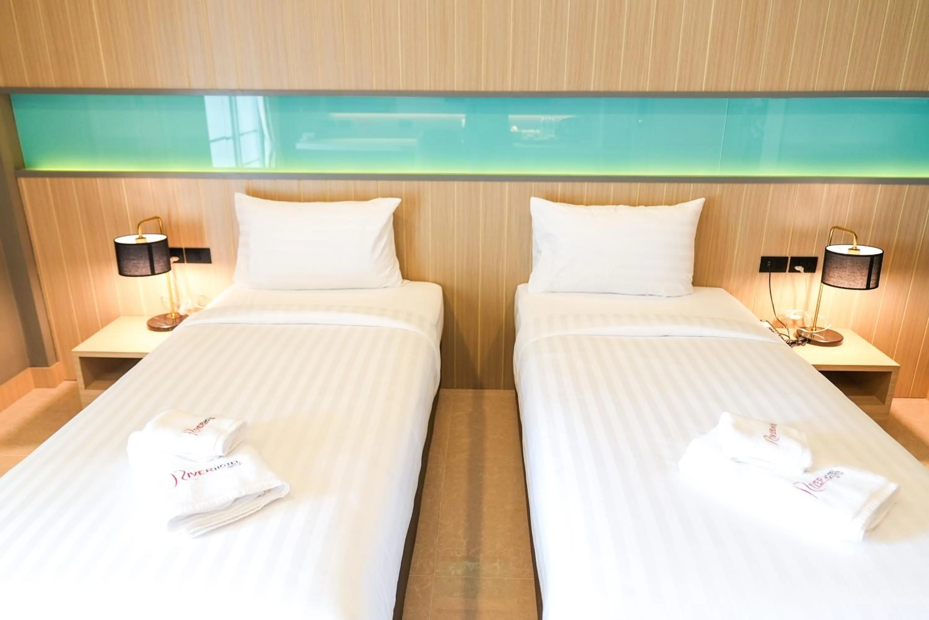 Bed in River Hotel Hatyai