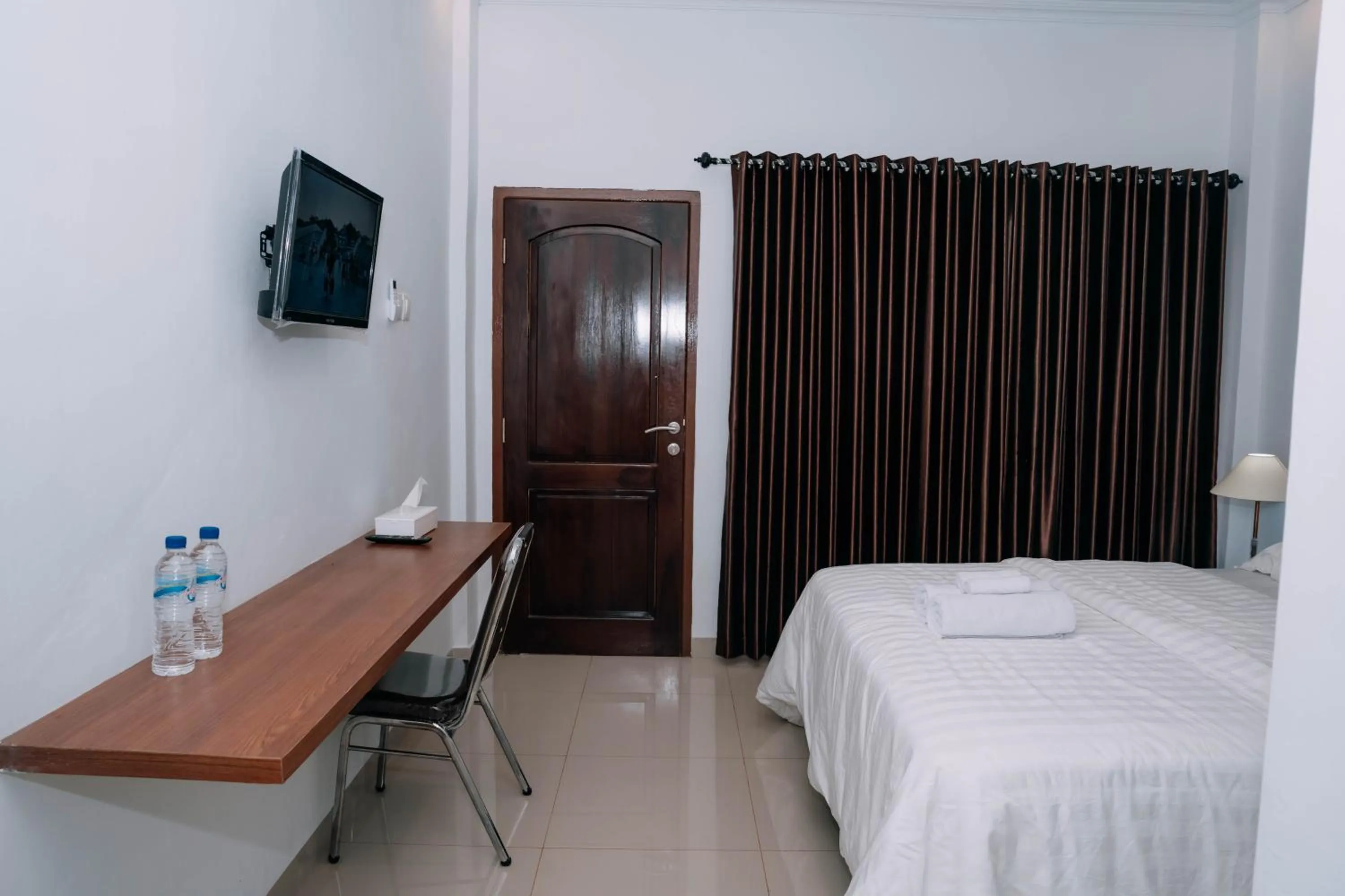 Bed in Fantasticroom Labuan Bajo