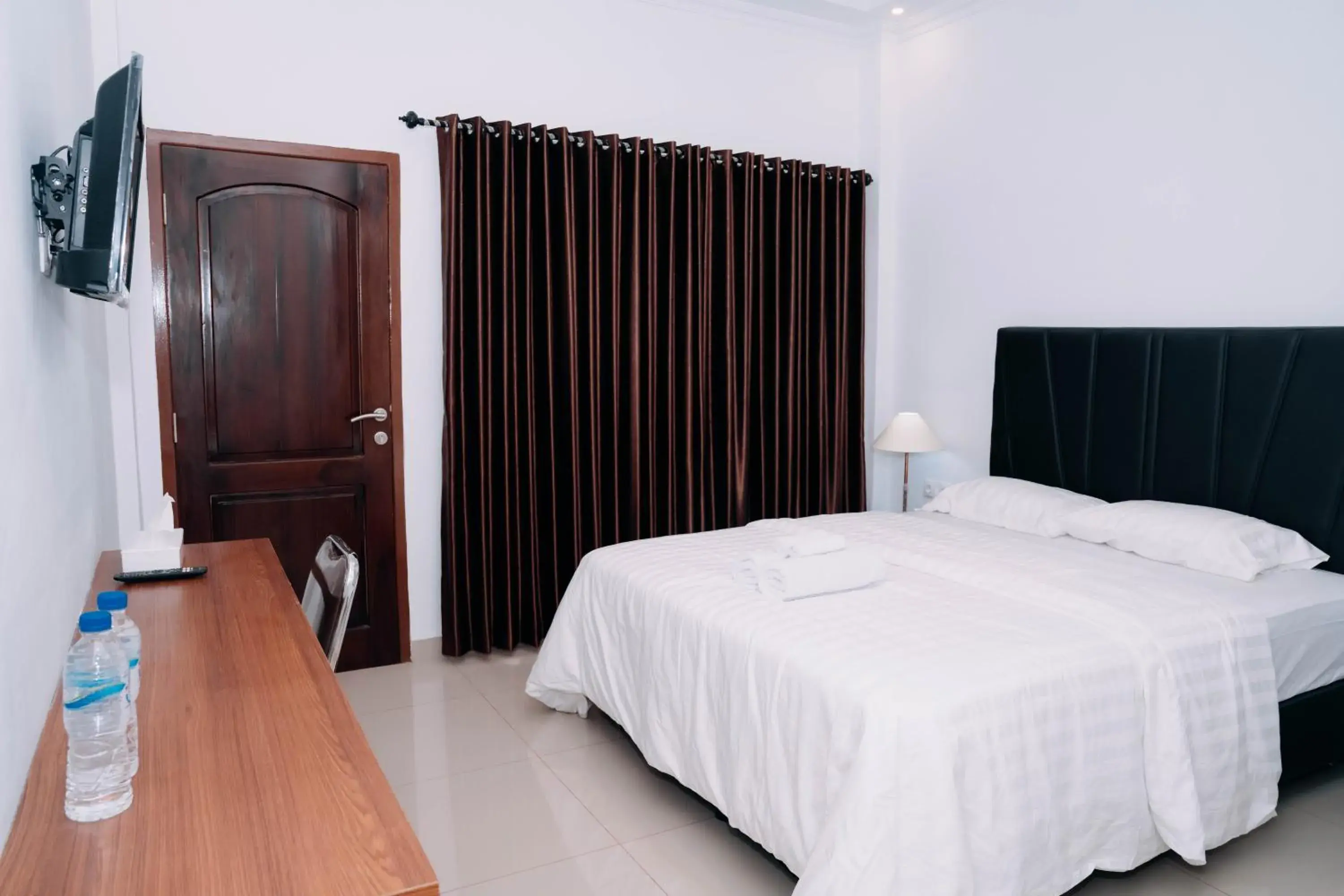 Bed in Fantasticroom Labuan Bajo Bed in Fantasticroom Labuan Bajo