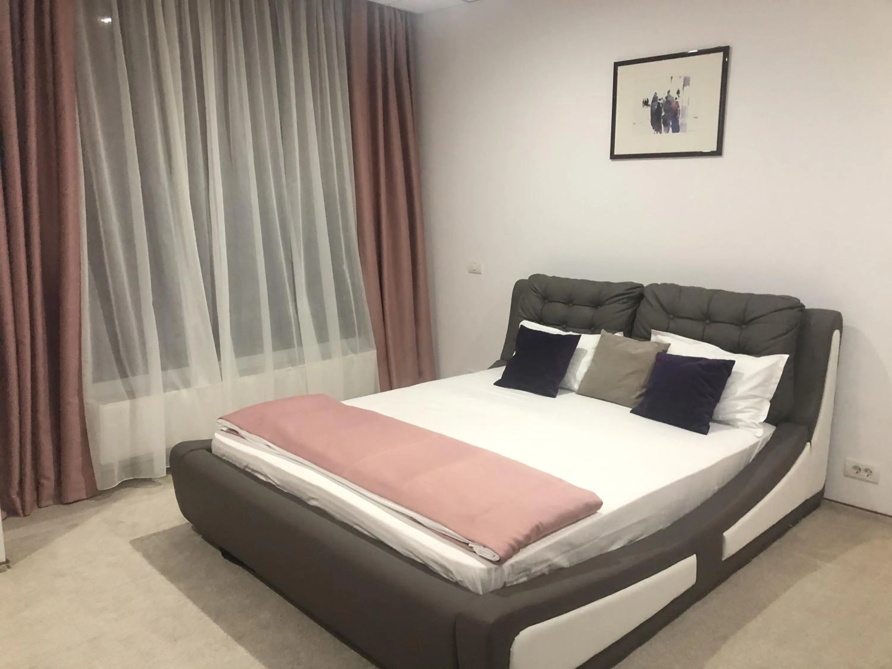 Bed in Uni88 Apart Hotel