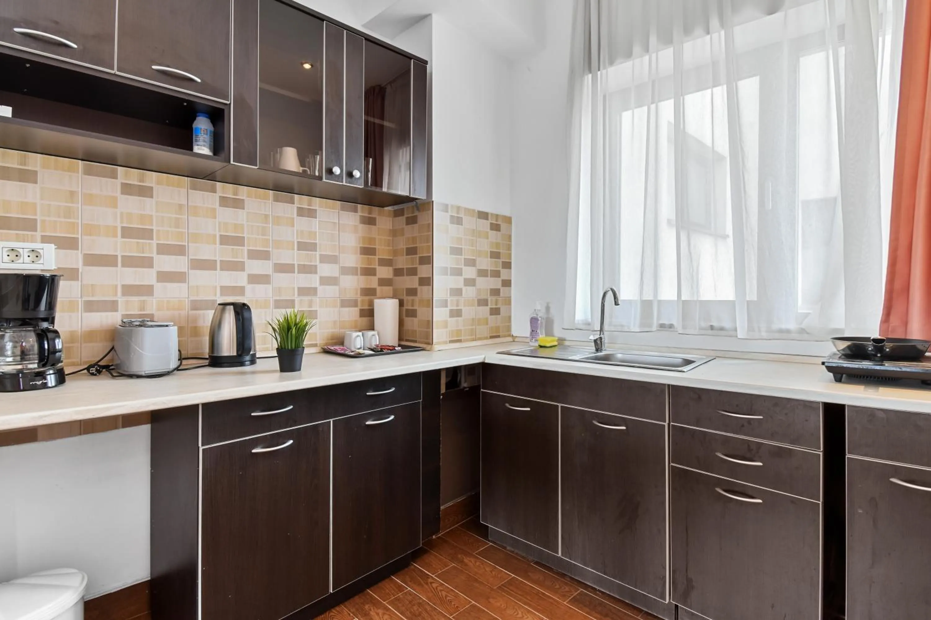 Kitchen or kitchenette in Uni88 Apart Hotel