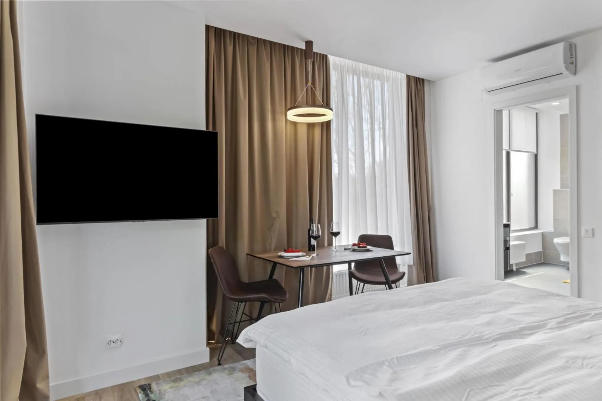 TV and multimedia, Bed in Uni88 Apart Hotel