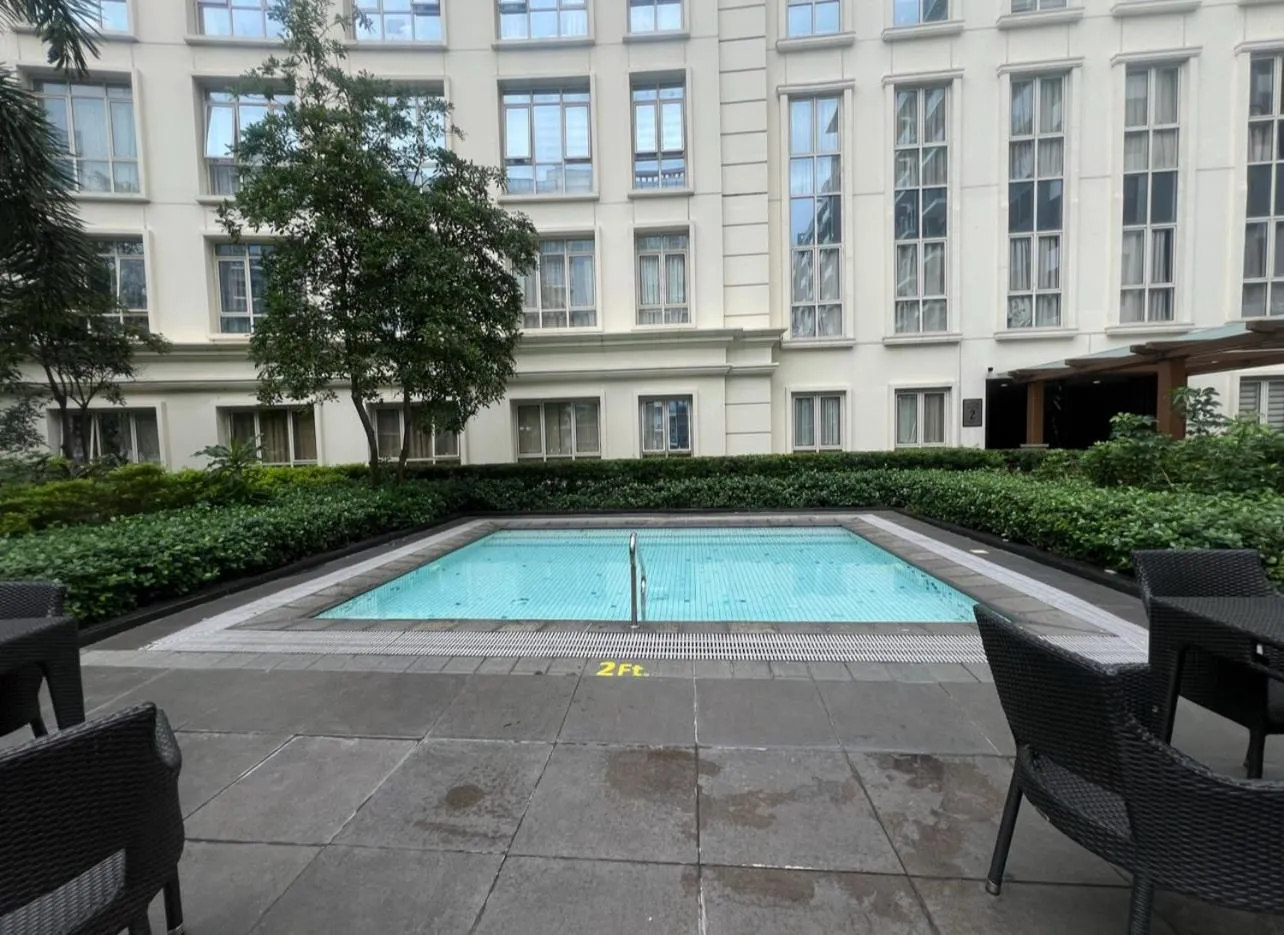 Swimming pool in Cozy Condo at Eighty One Newport Blvd across NAIA Terminal 3