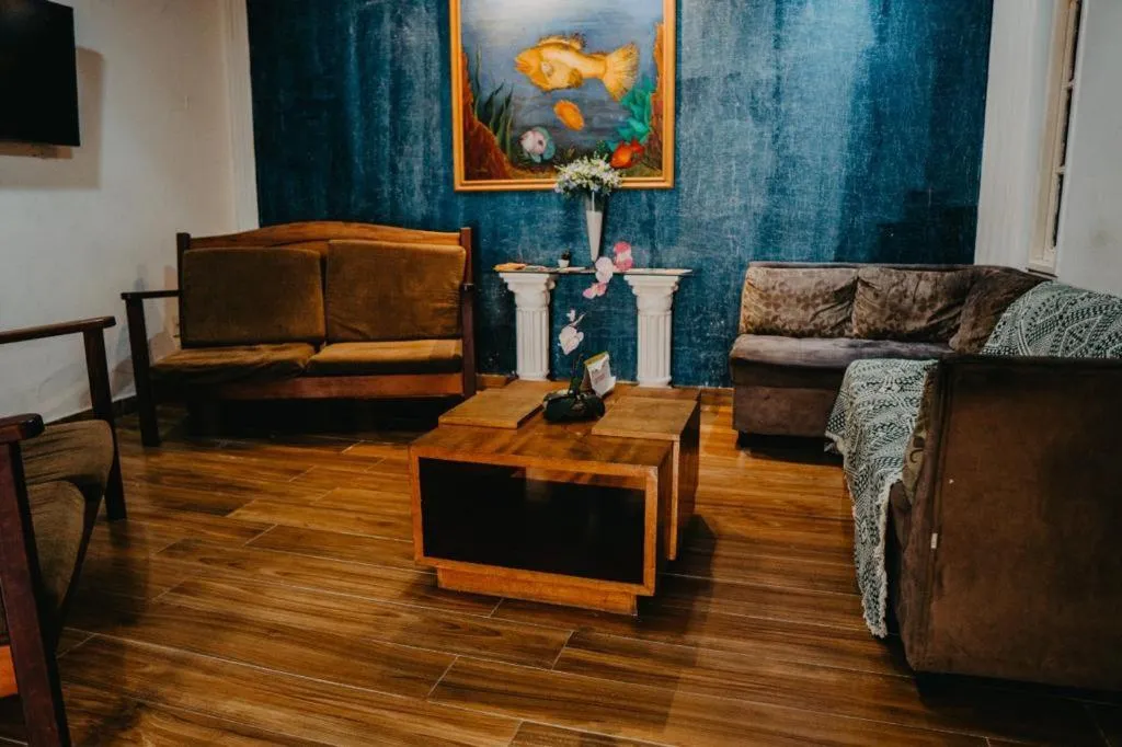 Communal lounge/ TV room in Pousada Garoupa