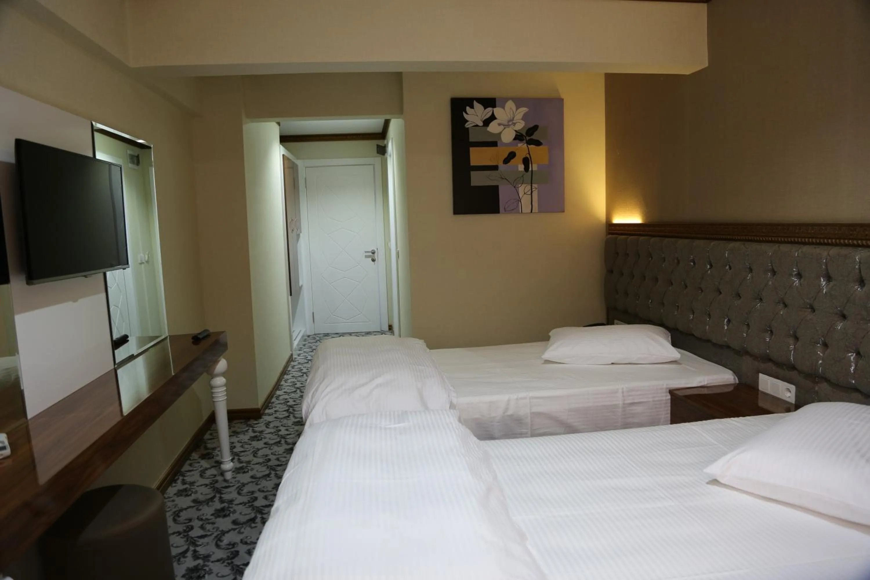 Photo of the whole room, Bed in Grand Sera Hotel