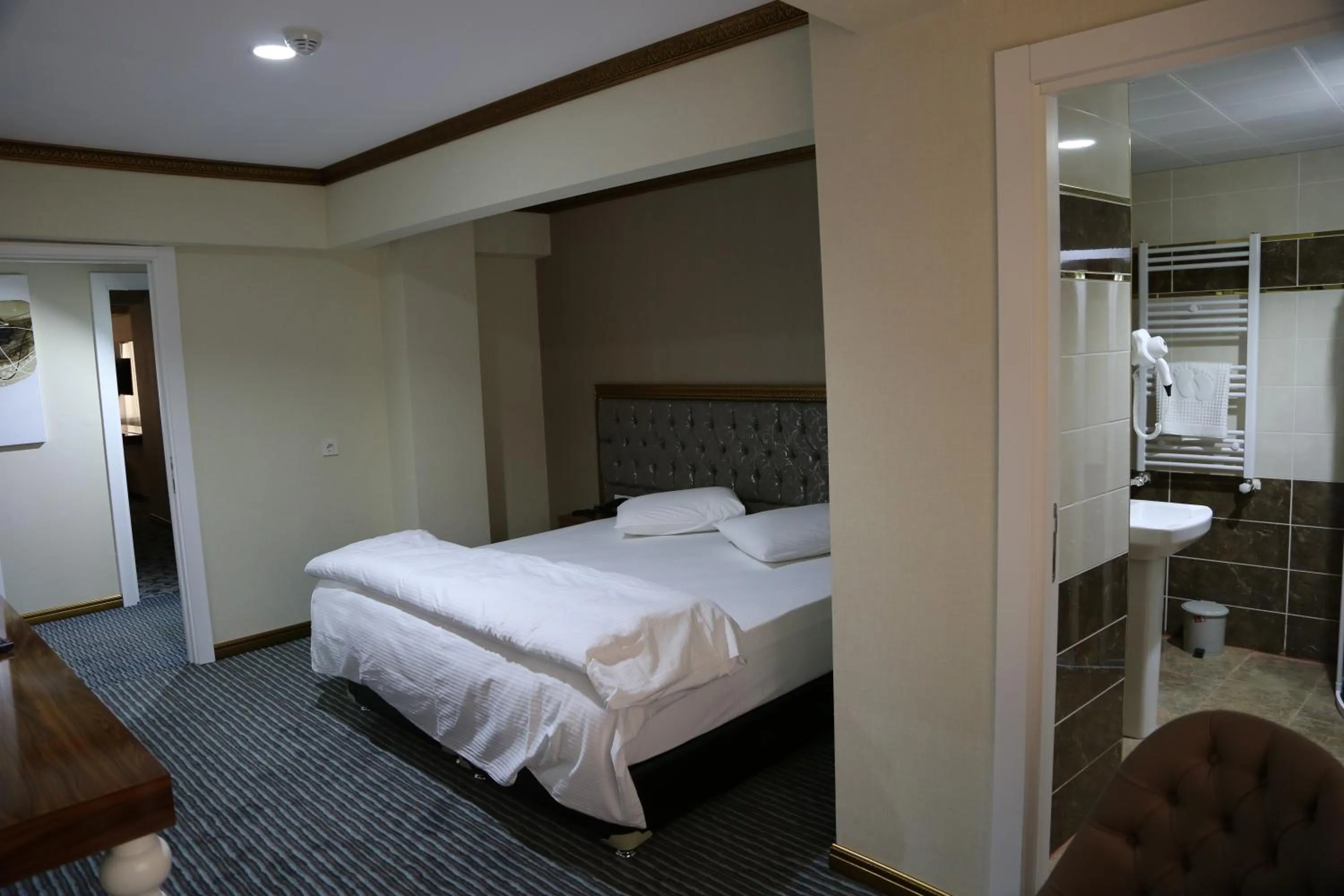 Photo of the whole room, Bed in Grand Sera Hotel