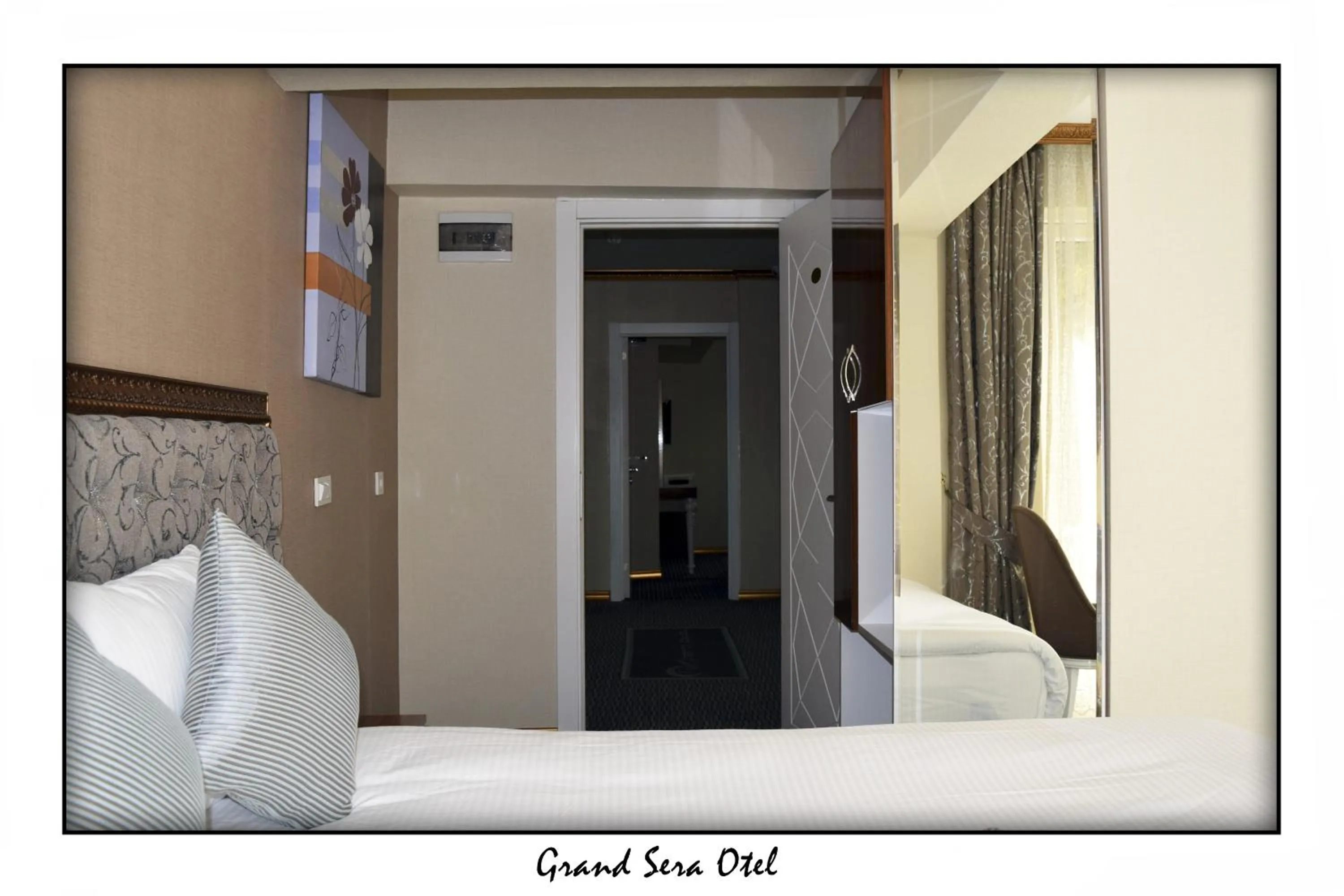 Photo of the whole room, Bed in Grand Sera Hotel