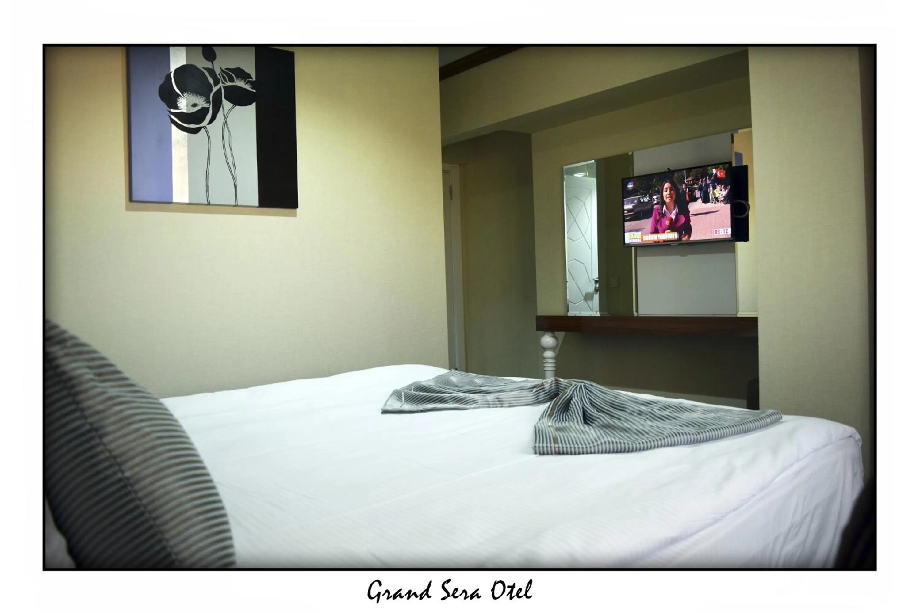 Photo of the whole room, Bed in Grand Sera Hotel