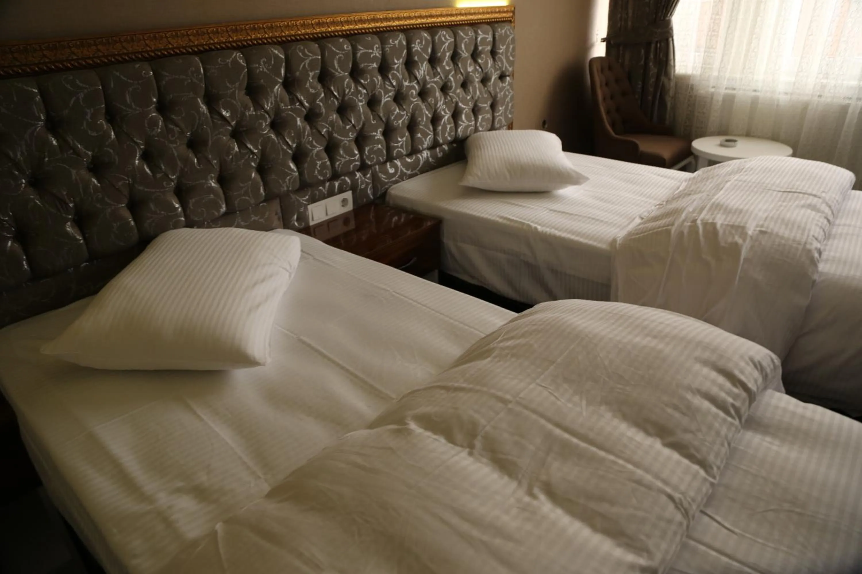 Bed in Grand Sera Hotel