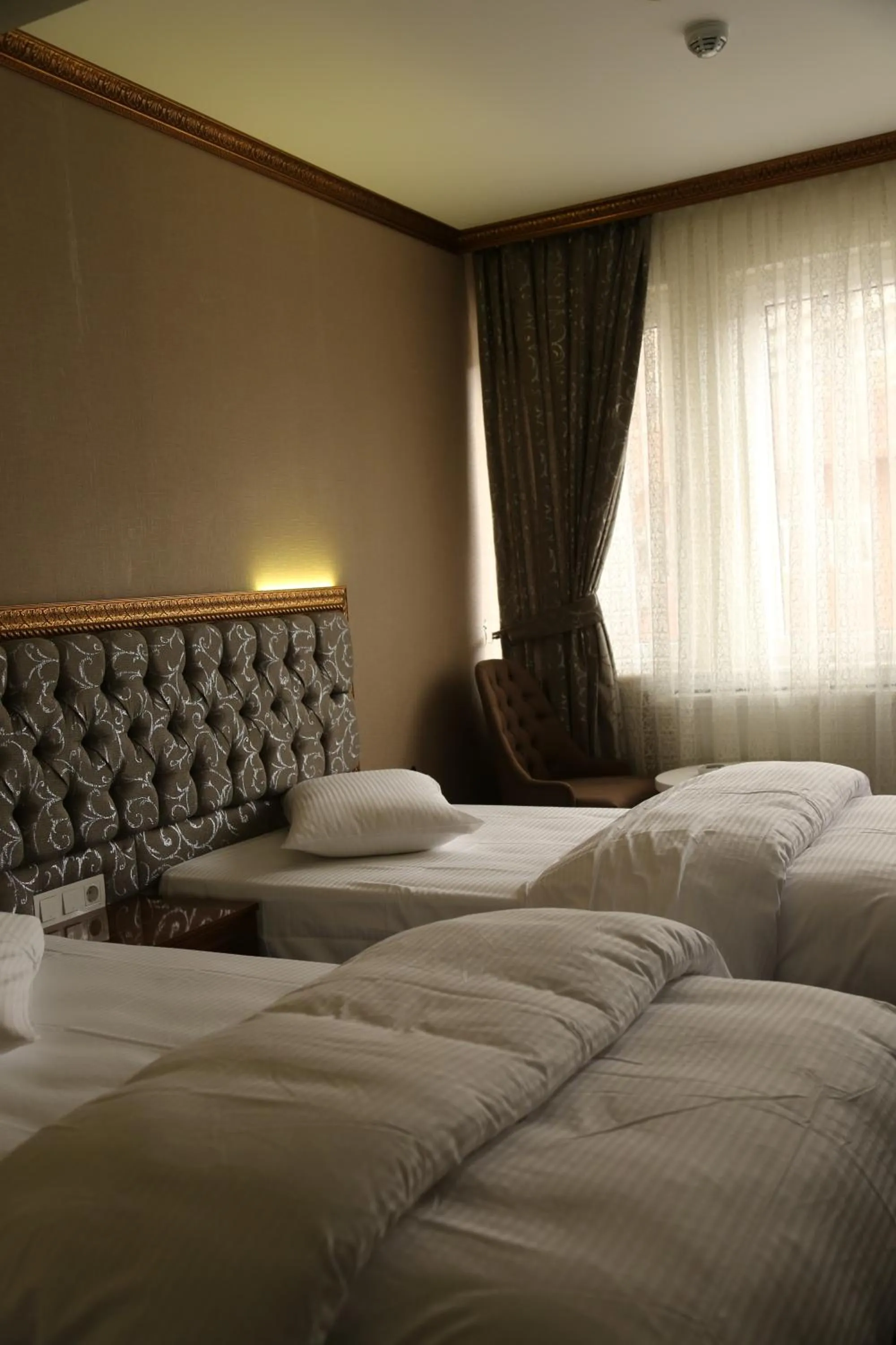Photo of the whole room, Bed in Grand Sera Hotel