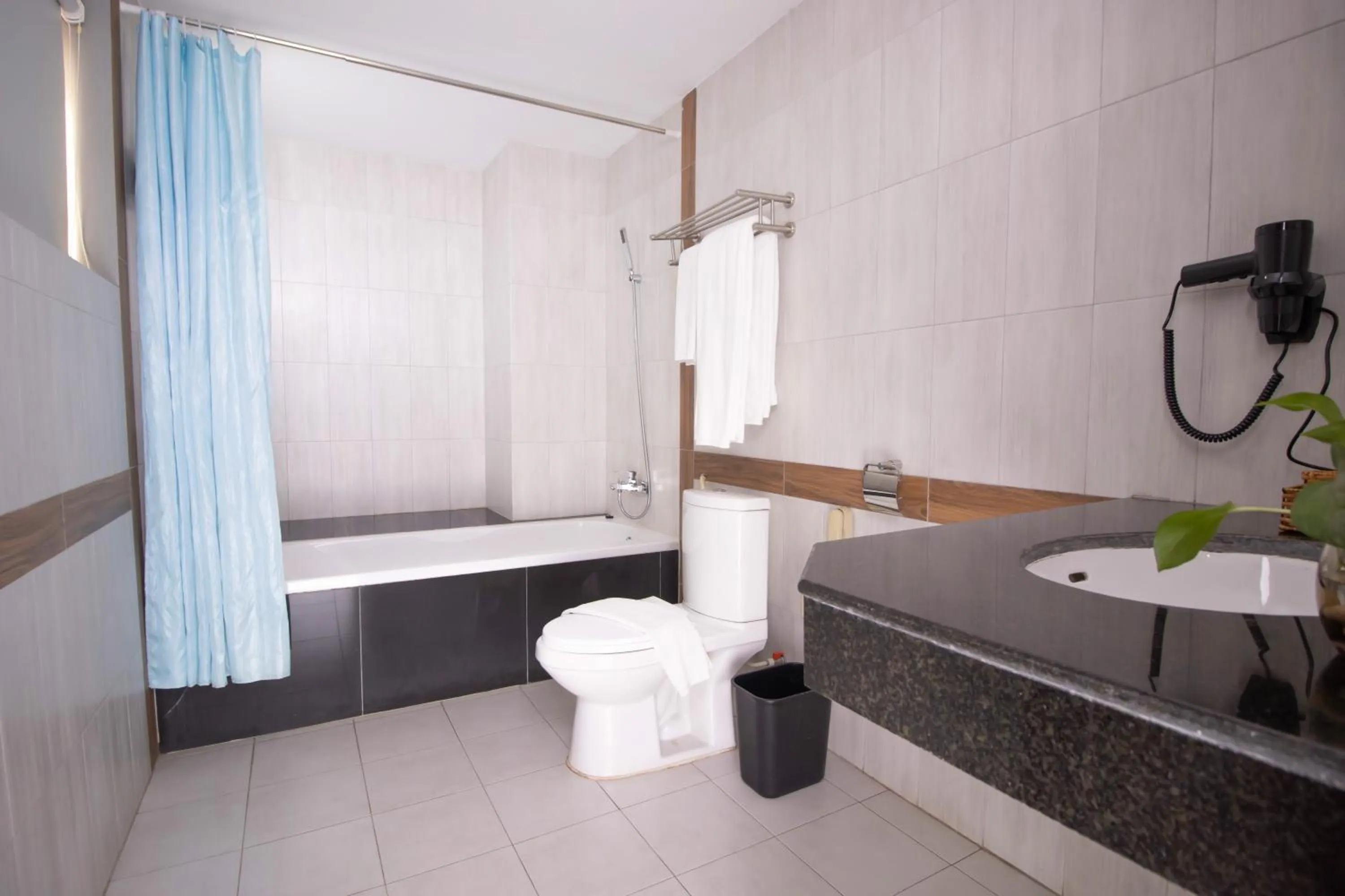 Toilet in Vrest Hotel